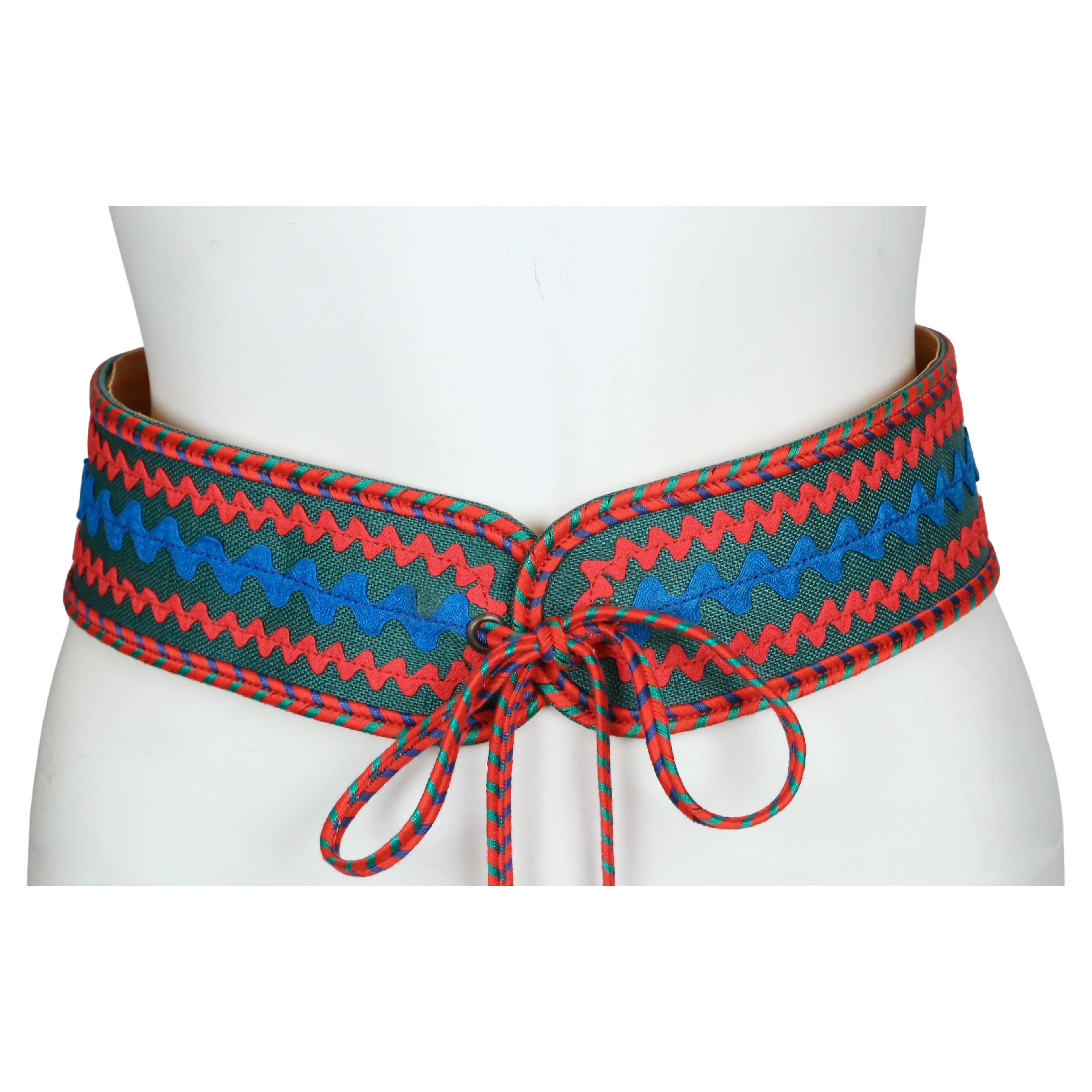 Black 1977 YVES SAINT LAURENT RUNWAY belt with ric-rac accents, long ties and tassels For Sale
