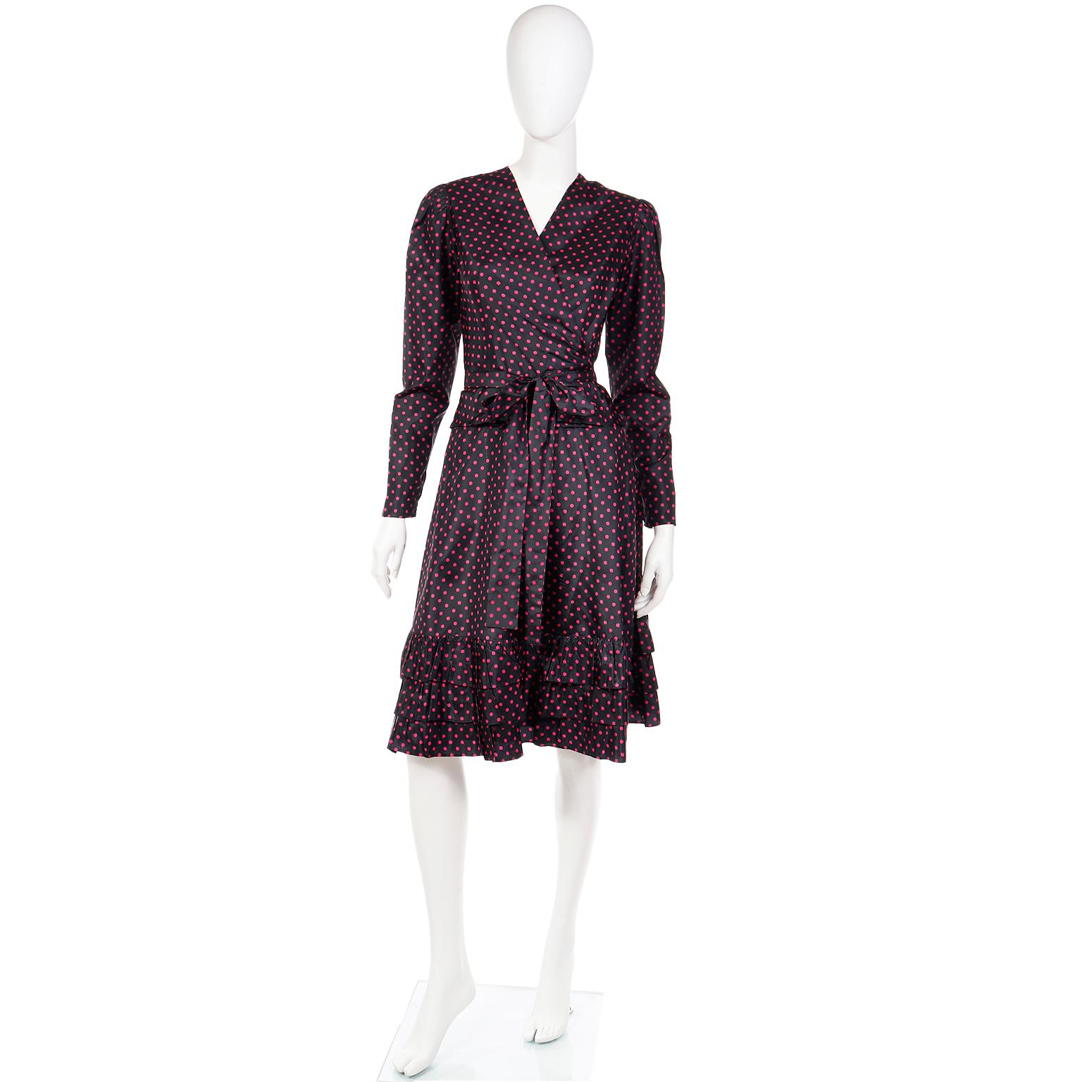 This is a lovely vintage Yves Saint Laurent late 1970's or early 1980's 2 piece dress in a luxe black taffeta with pink polka dots. This dress can be worn during the day or evening depending on the accessories.

This outfit includes a wrap top with