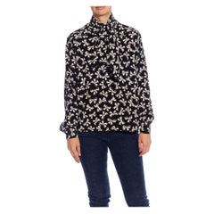 Chemisier à manches longues YVES SAINT LAURENT noir et blanc imprimé nœud célèbre, années 1970