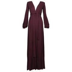 1970's YVES SAINT LAURENT deep plum jersey gown with plunging neckline & sash