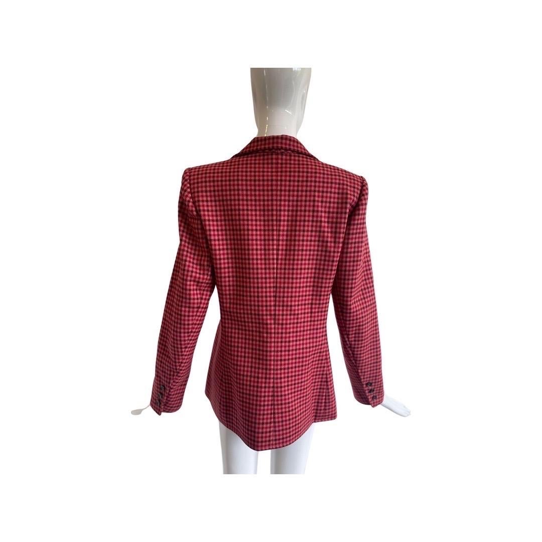 1970s Yves Saint Laurent heavy wool blazer, long boyfriend fit with two external front pockets at the hip and two at the chest.  Gorgeous and very unique colors, in a pink, burgundy and red checkered wool.  Judging by the wear on the label, this