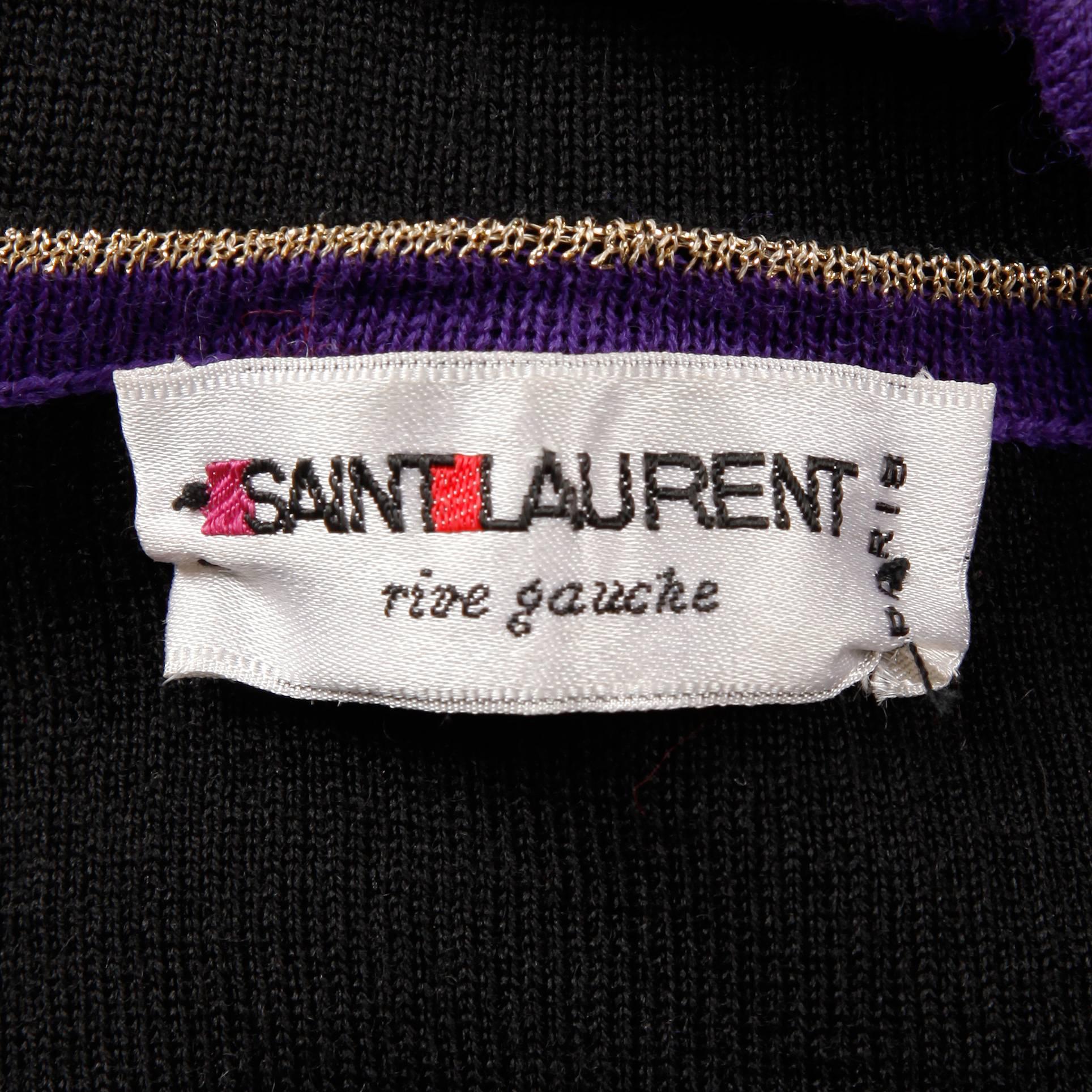 Vintage 1970s Yves Saint Laurent knit wrap sweater in purple, black and metallic gold. Unlined with side tie closure. Fits like a modern size small. The bust measures 29-35