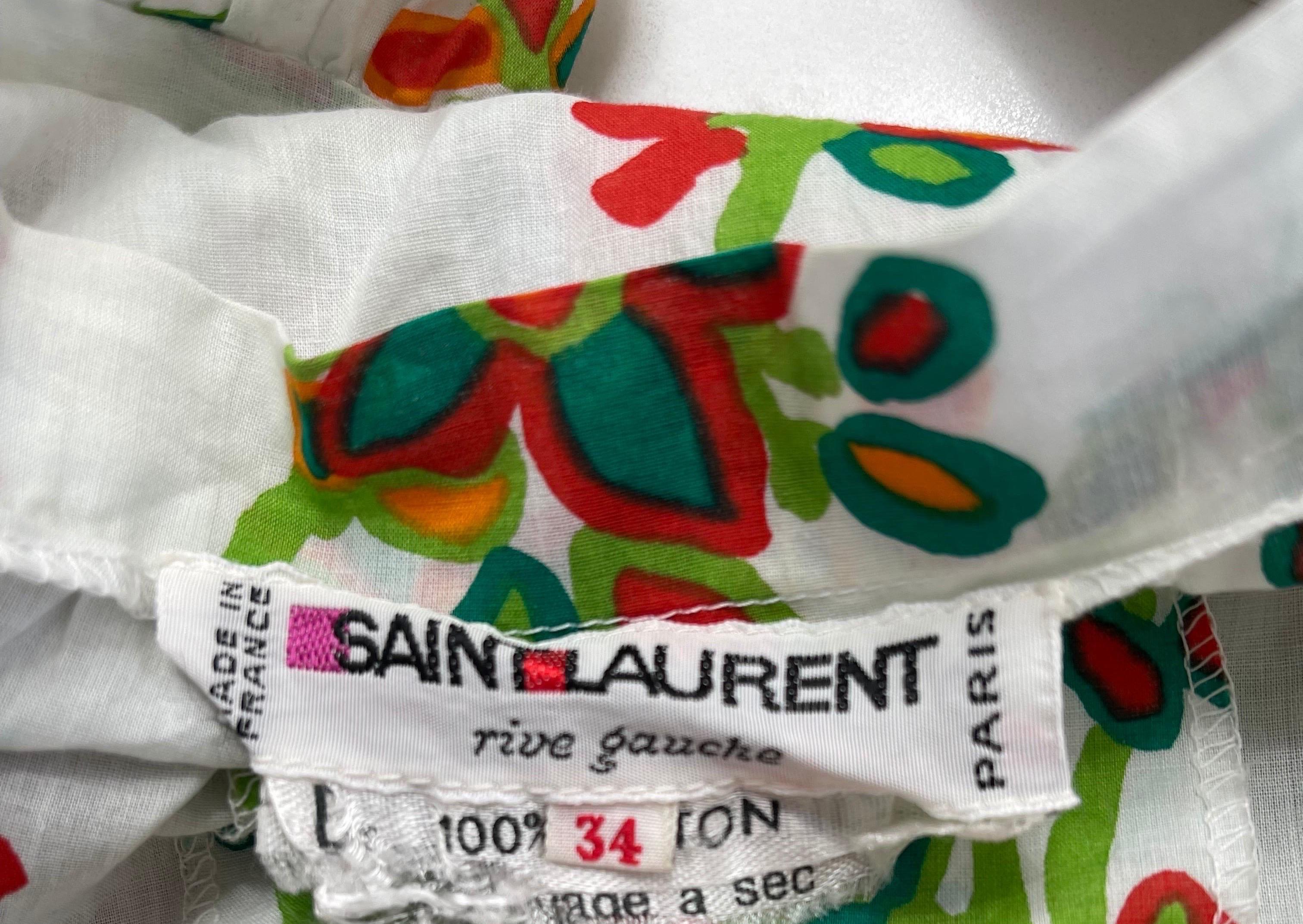 Chic vintage late 1970s YVES SAINT LAURENT Rive Gauche abstract floral print short puff sleeve blouse / shirt ! Lightweight cotton, features vibrant colors of burnt orange, marigold, green, and lime green throughout. Buttons up the front with a tie