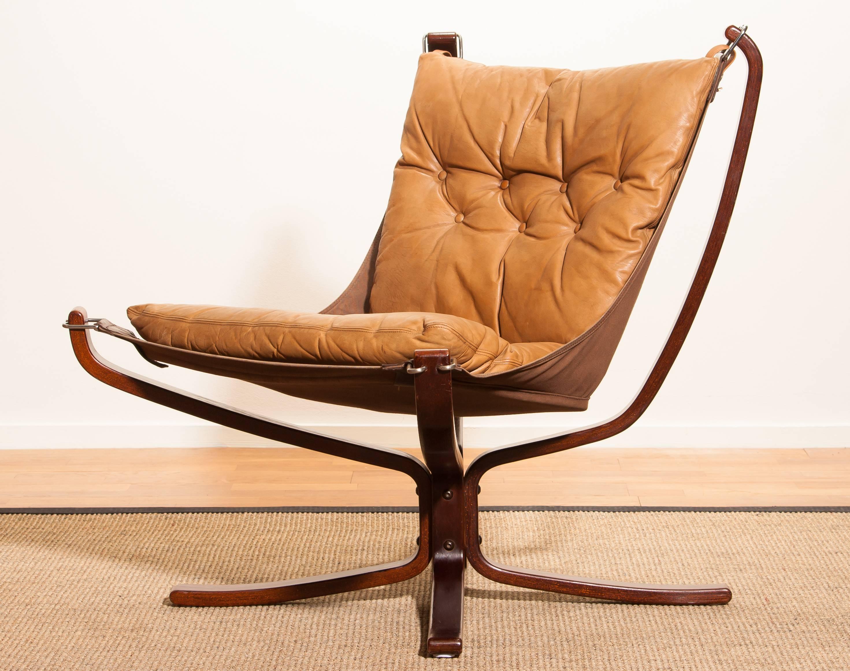 Wonderful armchair designed by Sigurd Ressell Norway.
The chair is in a very nice original condition.
Both, the camel leather seating as the wooden frame are in excellent condition.
Period 1970s.
Dimensions: H 80 cm, W 80 cm, D 75 cm, SH 40