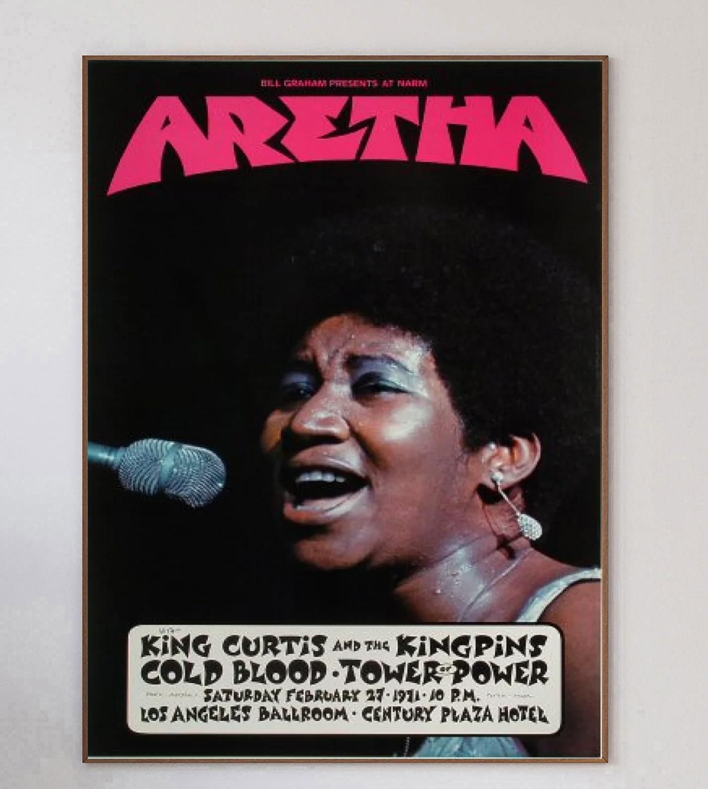 Designed by legendary concert poster artist David Singer with Jim Marshall, this beautiful poster was created in 1971 to promote a live concert of Aretha Franklin at the Los Angeles Ballroom in California. Bill Graham events such as this were well