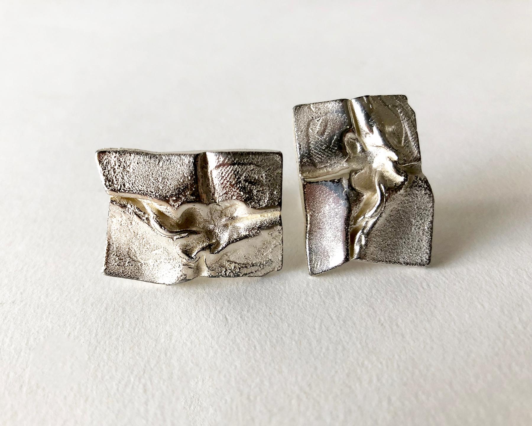 Sterling silver cufflinks created by Master sculptor and jeweler Bjorn Weckstrom of Finland.  Cufflinks are signed with the Lapponia hallmark, S7 (1971), Sterling, Finland, BW.  Suitable for a man or woman.  In very good vintage condition.