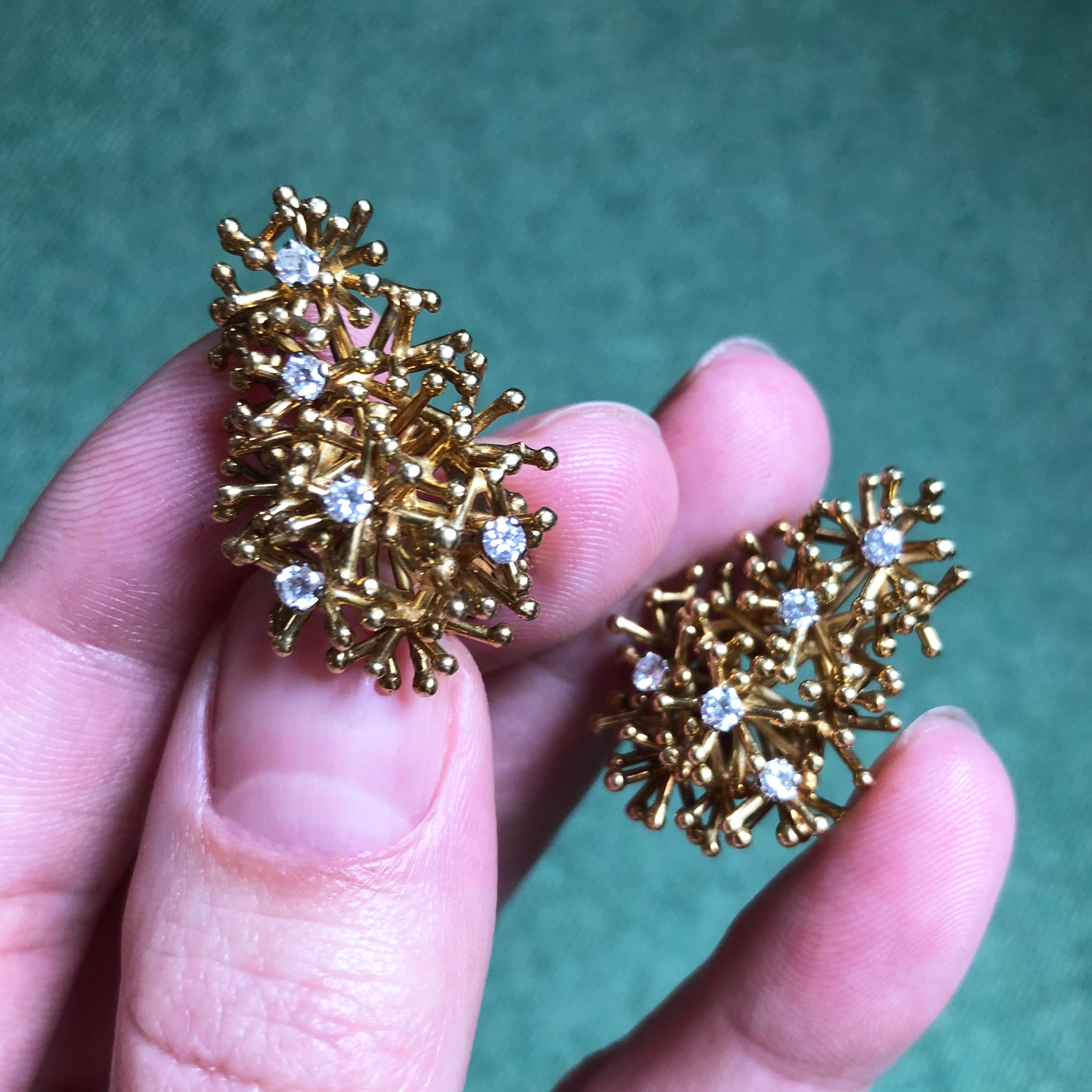 A pair of diamond and 18 karat gold wire work ear clips, by London jeweler, David Thomas, 1971. These ear clips measure 1.2