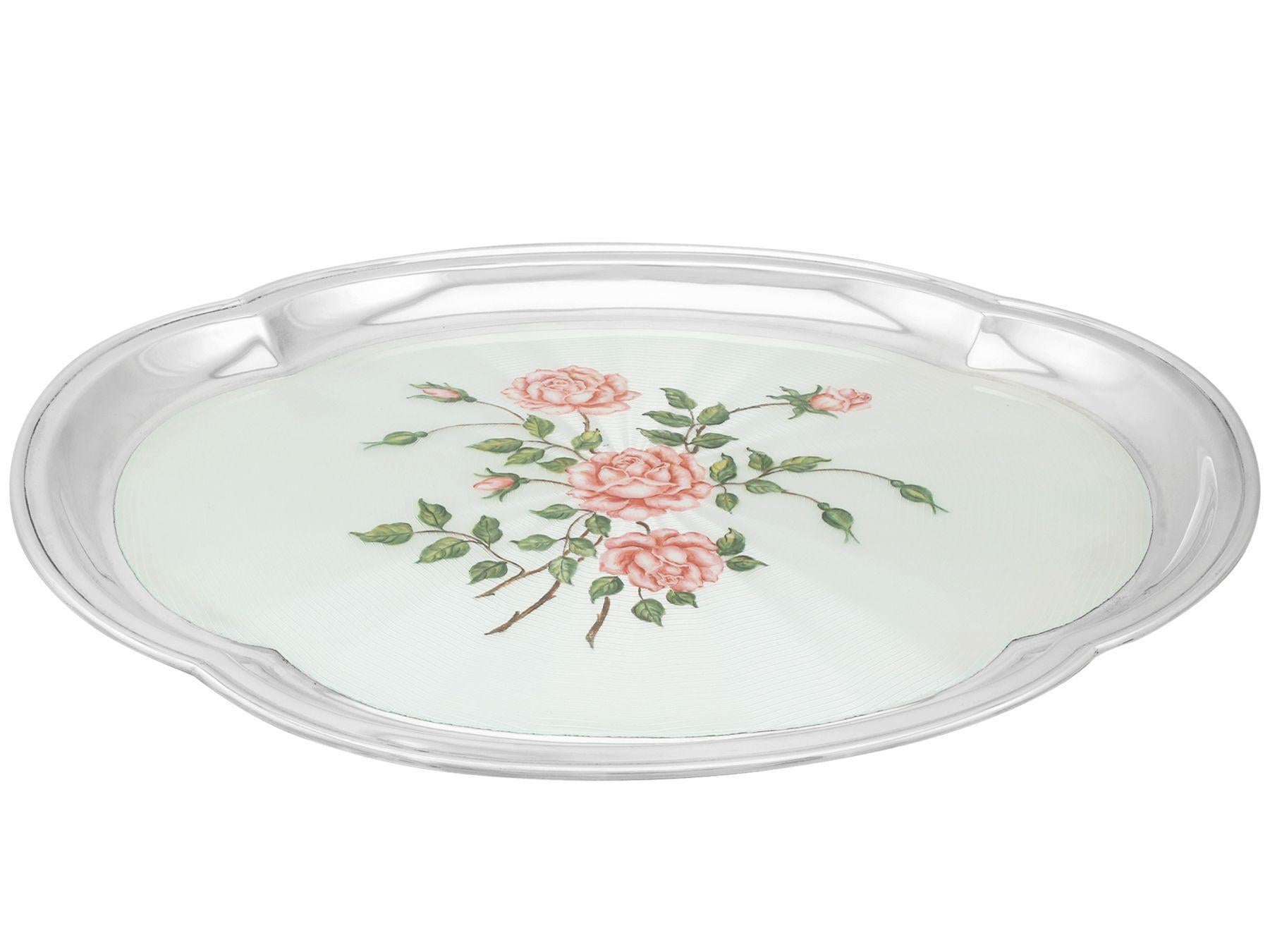 An exceptional, fine and impressive vintage Elizabeth II English sterling silver and enamel dressing table tray; an addition to our diverse ornamental silverware collection.

This exceptional antique sterling silver dressing table tray has a plain