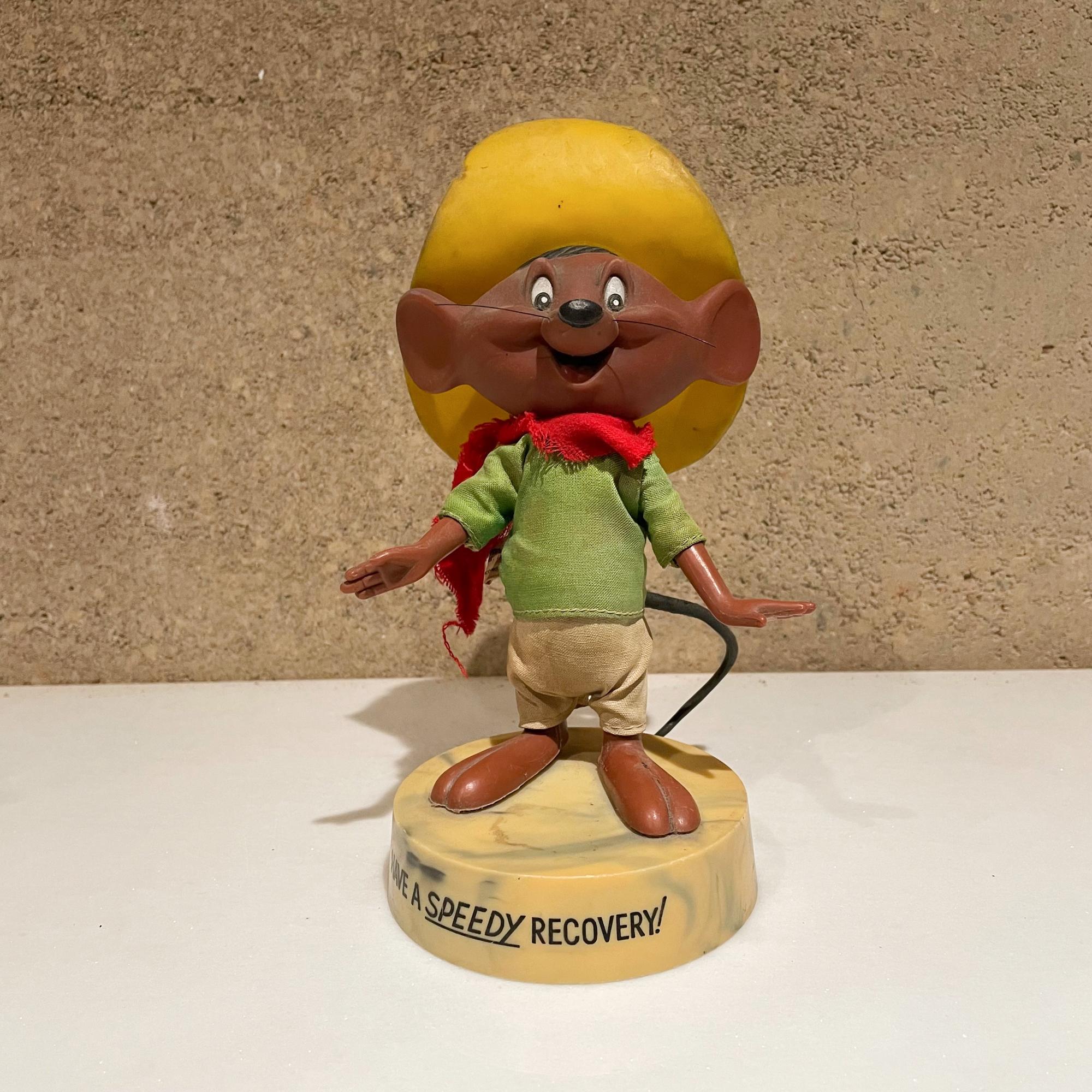 Speedy Gonzales Speedy Recovery!
1971 Cute Speedy Gonzales figure stating: Have a SPEEDY RECOVERY! Looney Tunes Warner Bros Vintage by R Dakin and Co.
Adorable midcentury vintage -great get well gift idea.
Measures: 8.5 x 5.5 D x 3.75 W