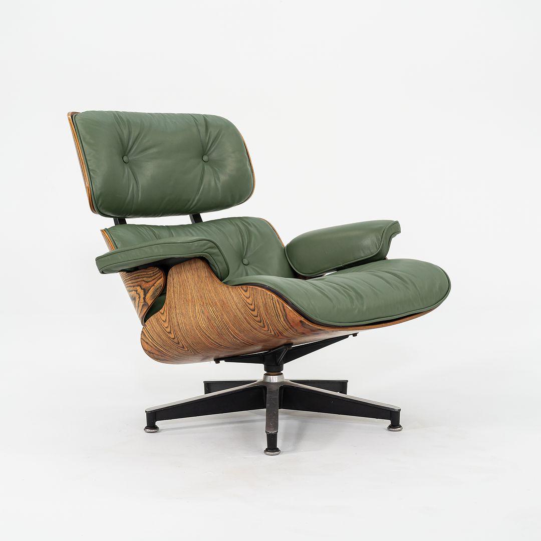 This is a massively unusual Herman Miller Eames Lounge Chair in Zebrawood, accompanied by a complimentary period-correct Eames Ottoman in Rosewood. Models 670 and 671 were initially designed by Ray and Charles Eames for Herman Miller in 1956. As