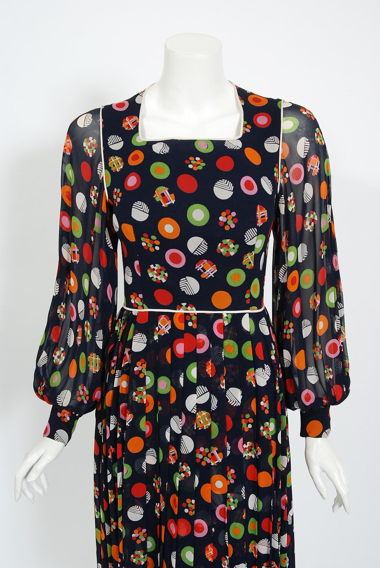 Gorgeous Christian Dior numbered demi-couture colorful print silk chiffon dress dating back to 1972. Christian Dior designed under his own name for only a decade, but his influence is everlasting. When the talented Marc Bohan took over as head