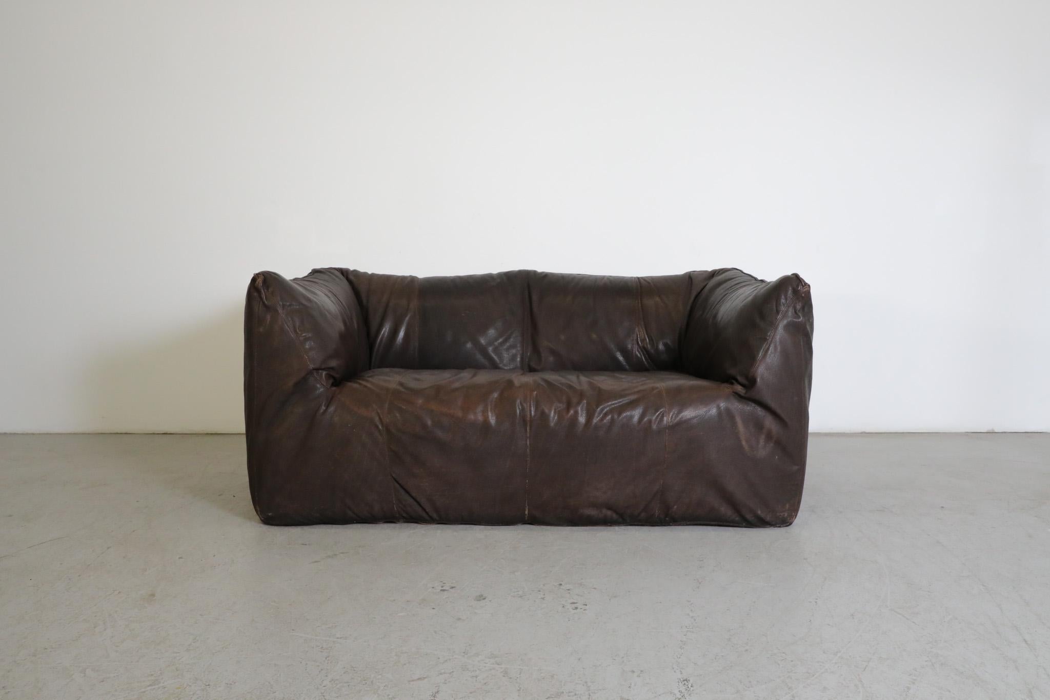 Dark brown leather soft form sofa 'Le Bambole' designed by legendary Italian designer Mario Bellini for B&B Italia, 1972 and awarded with the Compasso d'Oro in 1979. An absolute icon of timeless design, contemporary form, and luxurious comfort.