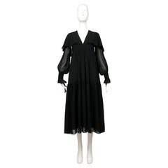 1972 OSSIE CLARK black chiffon tiered evening dress with capelet
