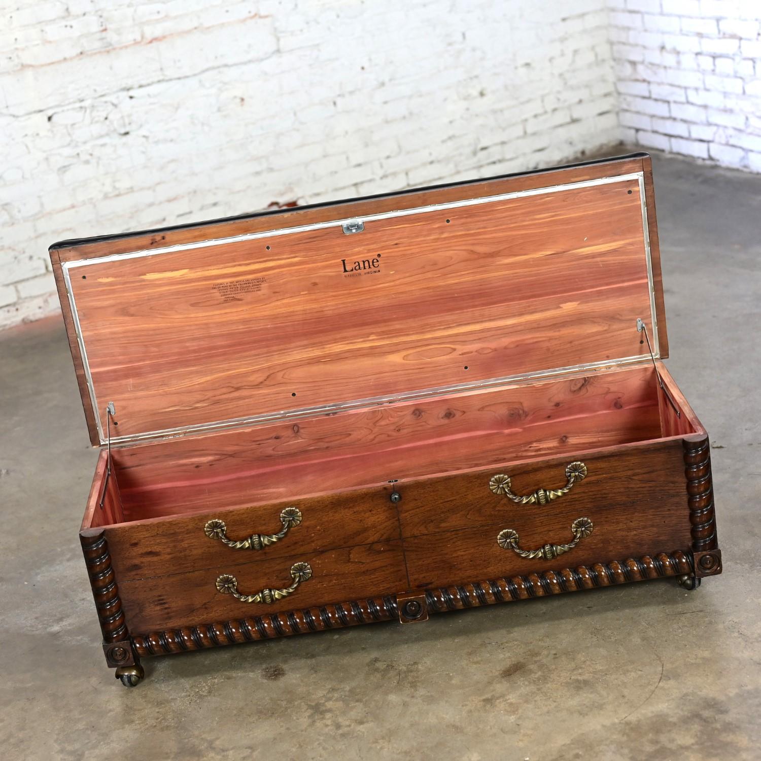 Late 20th Century 1972 Spanish Revival Lane Cedar Chest with Black Vinyl Bench Top Brass Handles