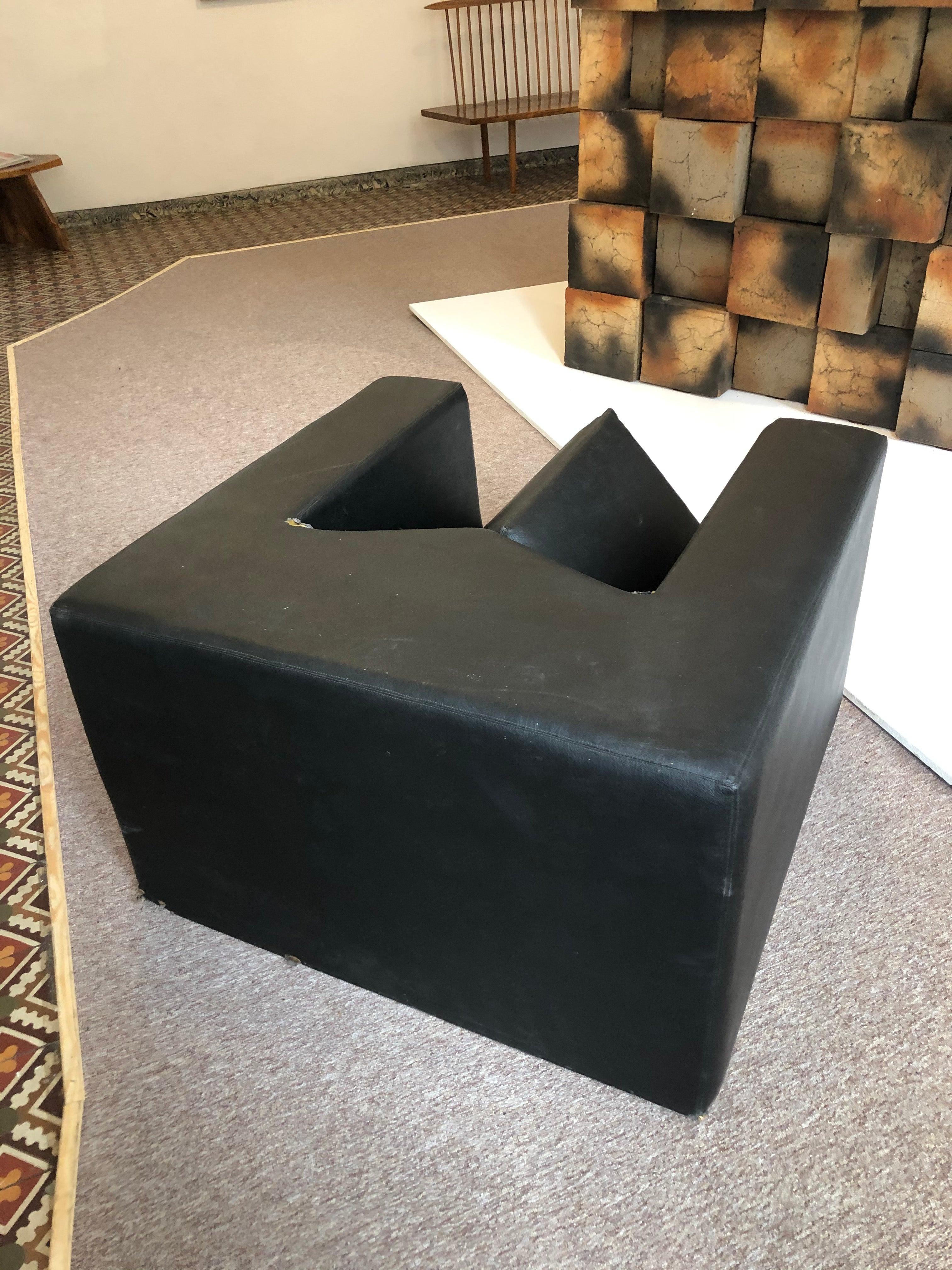 “Sculpture” armchair, 1969 polyurethane foam covered with black vinyl signed at the base H 58 cm, W 95 cm, D 94 cm This work is registered in the archives of Madame Denyse Durand-Ruel under n ° 5897 this armchair was produced in 3 copies, only two