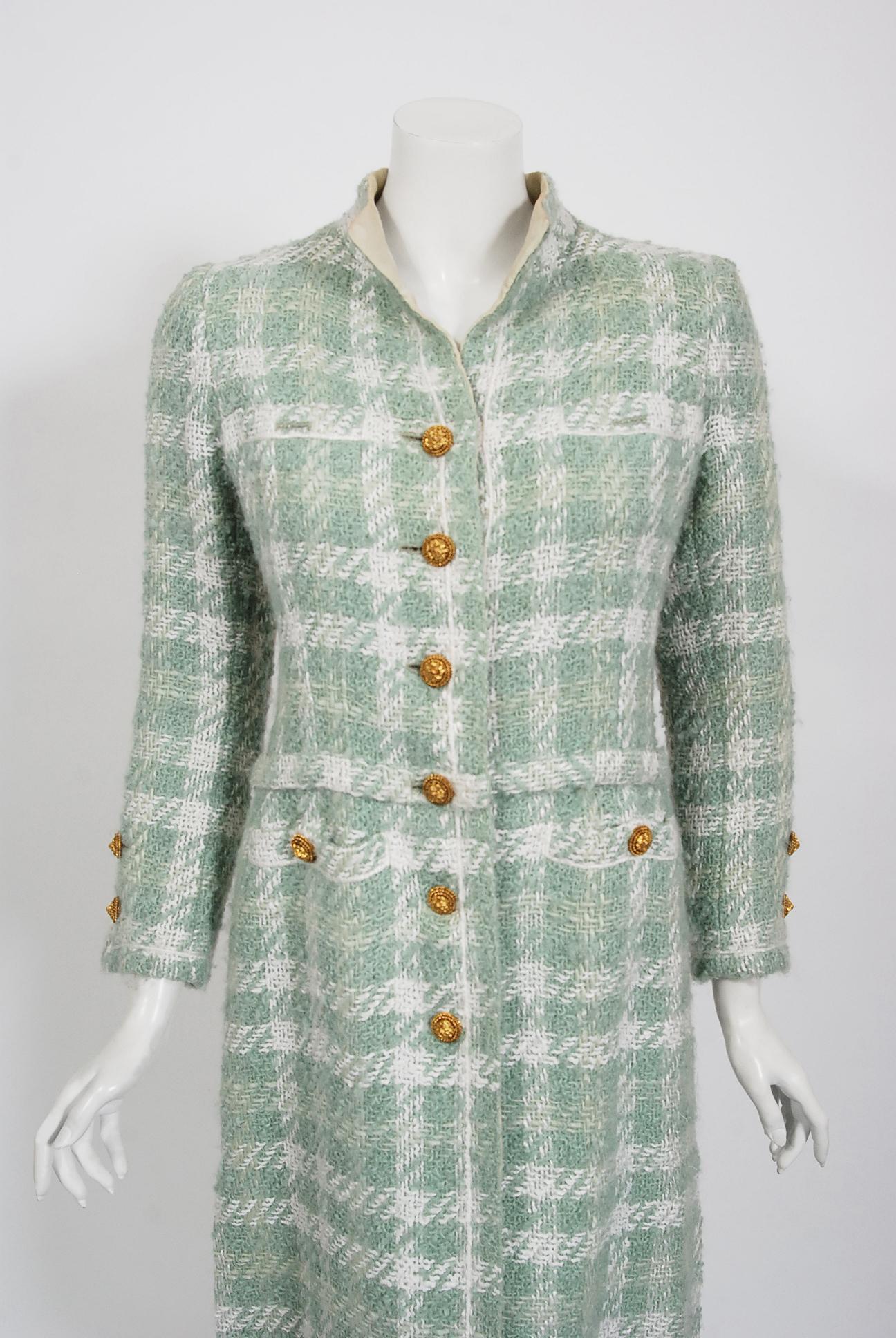 Chanel is known to be one of the most luxurious and decadent fashion houses in the world. This breathtaking seafoam green boucle plaid wool coat from their 1973 haute couture fall-winter collection is a perfect example of why this couture brand has