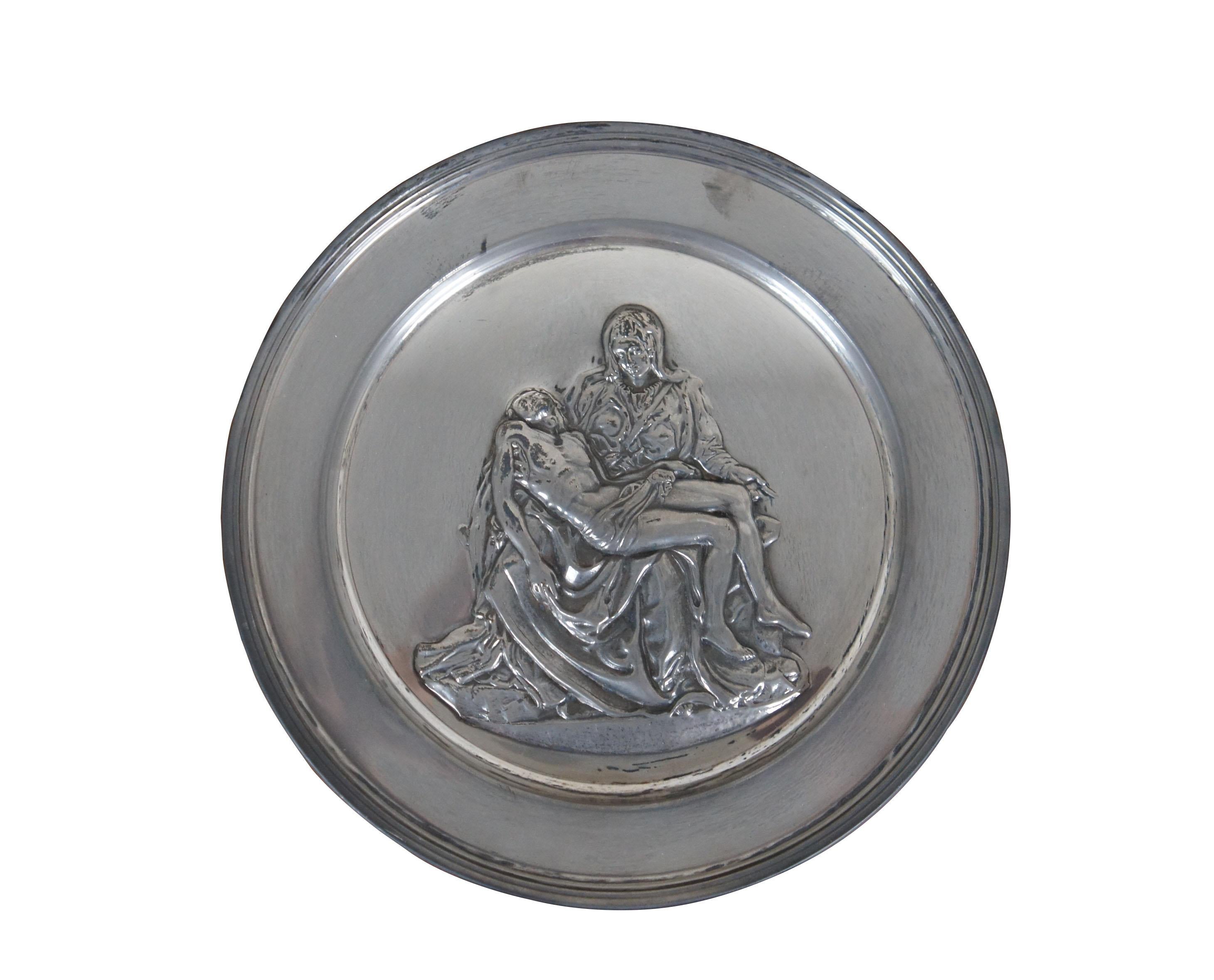 Late 20th century Danbury Mint sterling silver collector's plate depicting a relief of 