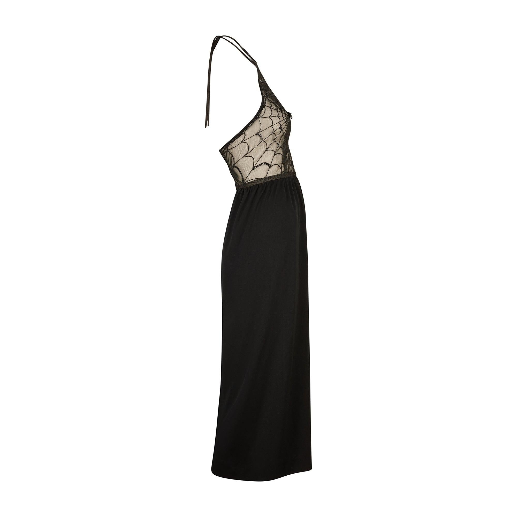 Fine and rare Jean Varon spider cobweb dress which can be dated to the designer's 1973 collection.  We have featured a very famous dress with the same cobweb design from the September issue of British Vogue, also part of Circa's collection. The