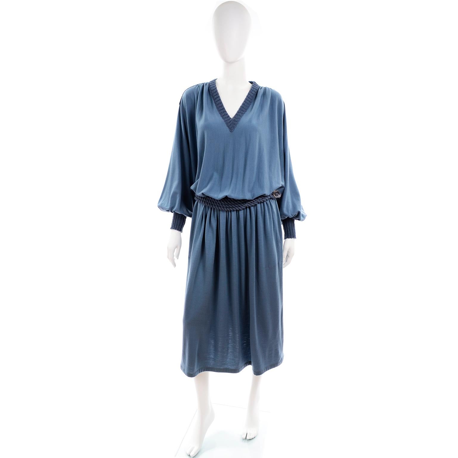 This is a vintage Missoni blue wool knit dress from 1973.  This iconic 1970's dress has a drop elastic waist and a pretty rope belt with a lucite clasp.  The dress has knit trim on the cuffs, shoulders and collar and slips overhead with no closures.