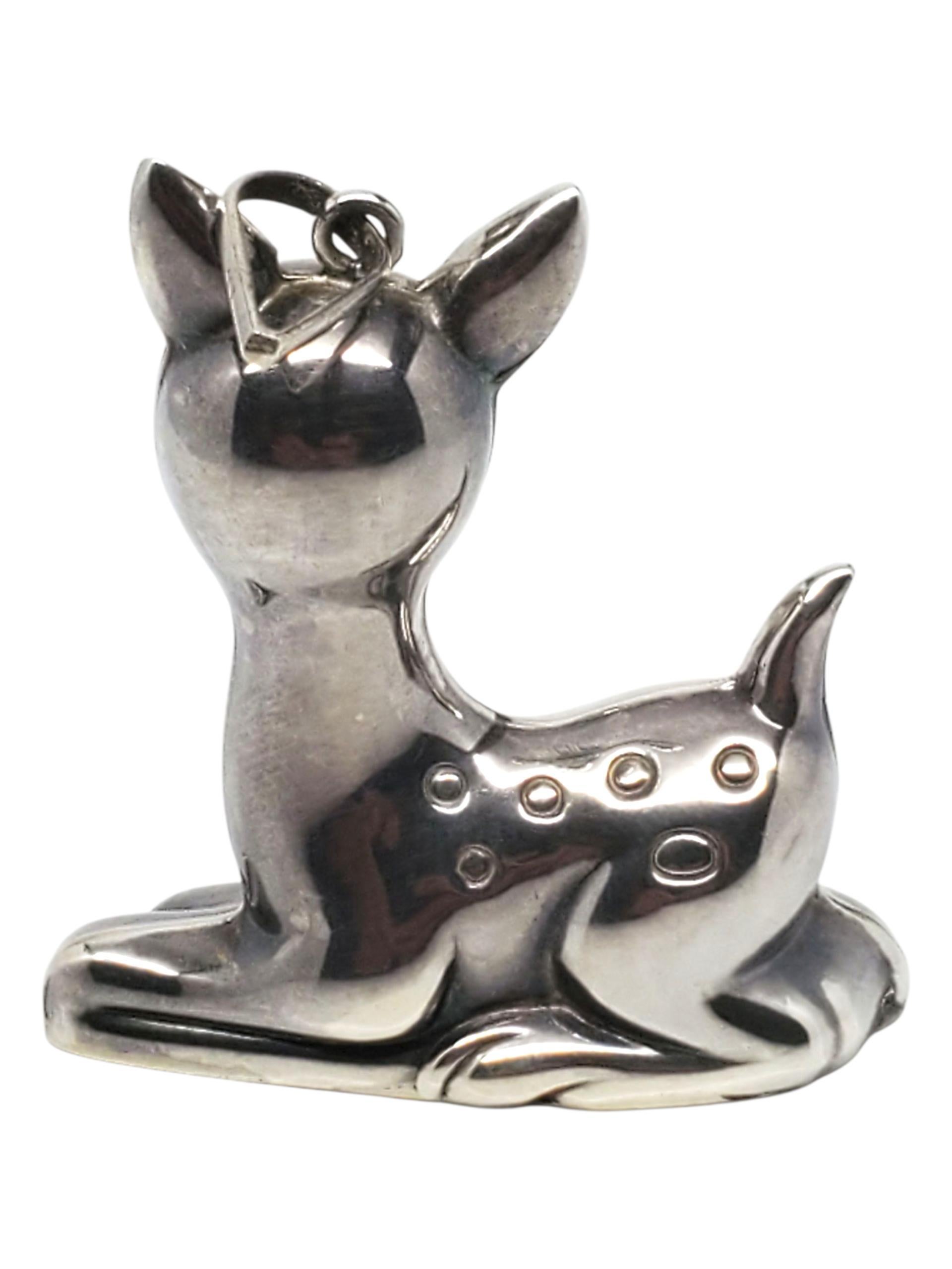 R. Ciondolo a forma di cervo in argento sterling di M. Trush - M. I.

Questo ciondolo in argento massiccio di R. M. Trush presenta un cervo ben dettagliato con corna in rilievo e corpo strutturato.

Dimensioni: 47,5 mm x 42,8 mm x 14,9 mm

Peso: