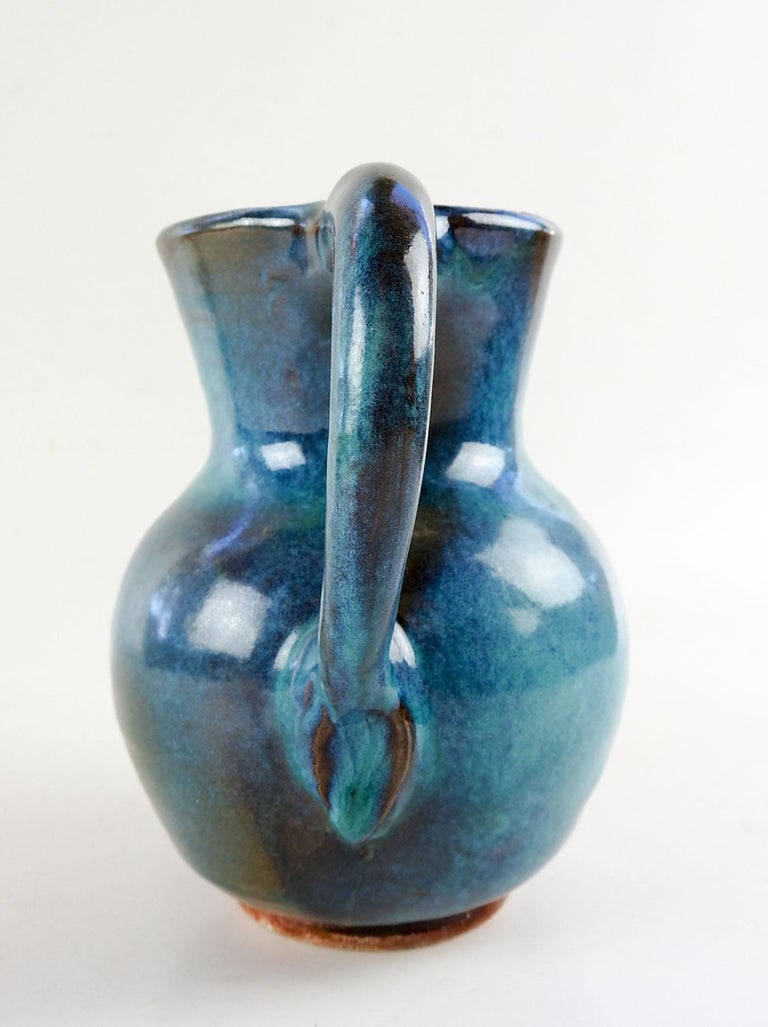1973 Turquoise Blue Harding Black Pottery Pitcher For Sale at 1stDibs