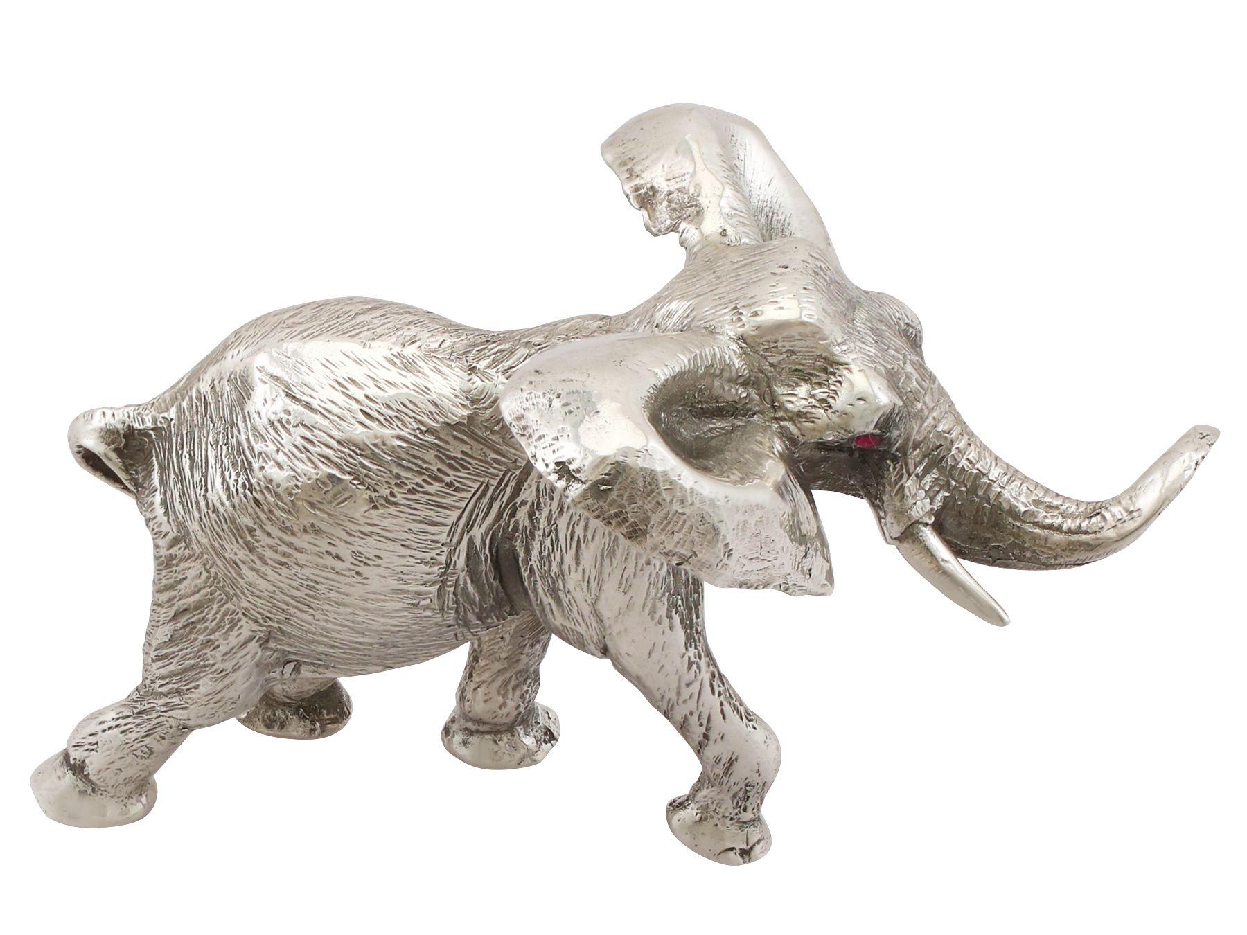 An exceptional, fine and impressive vintage silver model of an elephant; part of our ornamental silverware collection

This exceptional vintage cast sterling silver ornament has been realistically modelled in the form of an elephant.

This