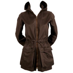 1973 YVES SAINT LAURENT brown cotton jacket with quilted hood and waist tie