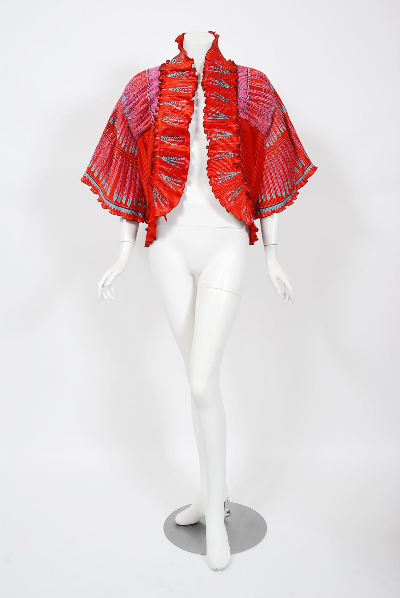 Breathtaking Zandra Rhodes Couture hand-painted jacket dating back to her 1973-74 Ayers Rock collection. During the 1970's, Zandra Rhodes was one of the British designers who put London at the forefront of the international fashion scene. Her