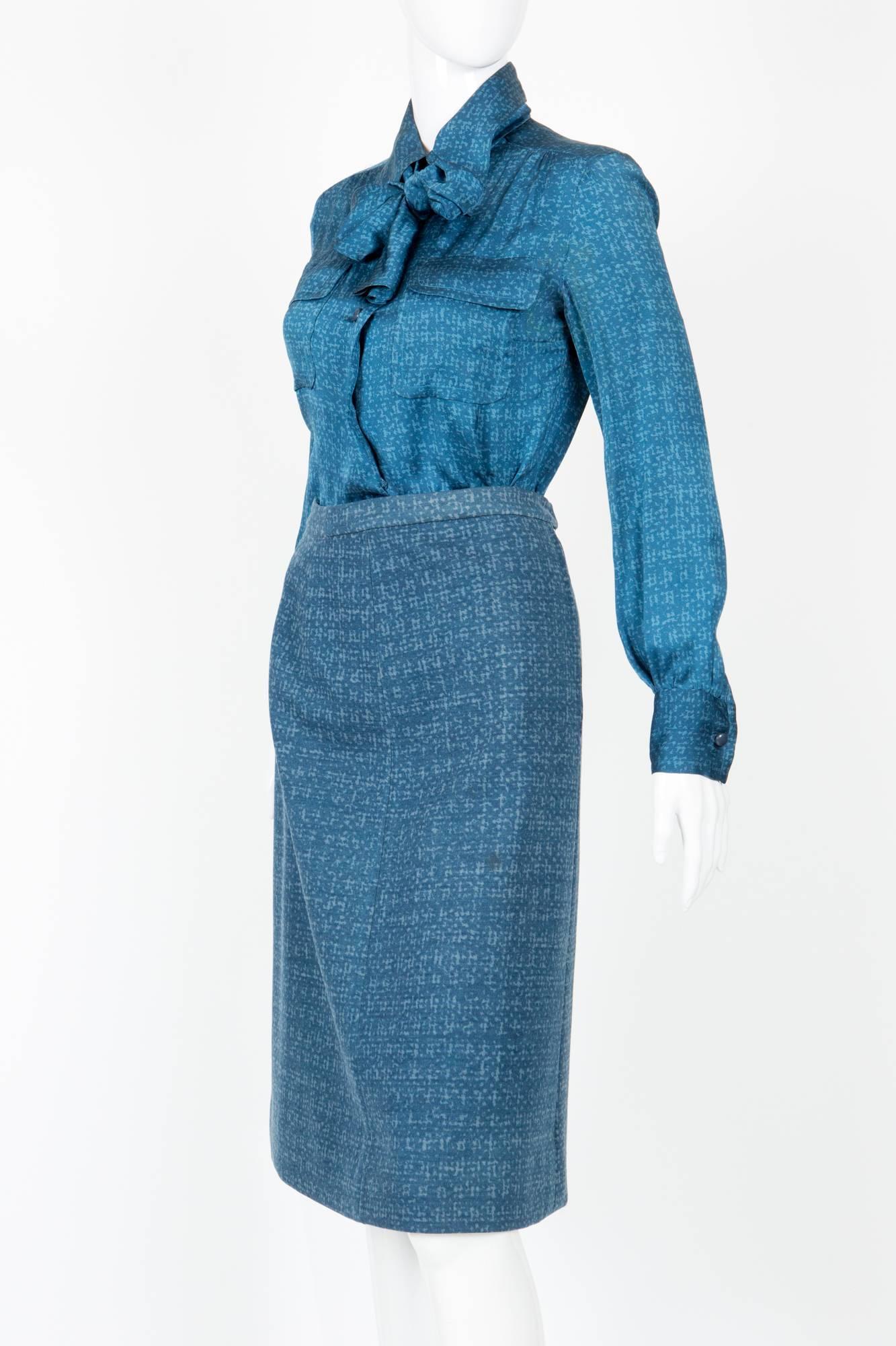 1973s Haute Couture winter Christian Dior by Marc Bohan blue printed suit numbered 002856 featuring a silk shirt top with a separated bow tie and a matching print wool skirt.
In good vintage condition. Made in France.
Estimated size 36fr/ US4/