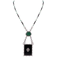 19.74 Carat Emerald and Black Onyx Necklace