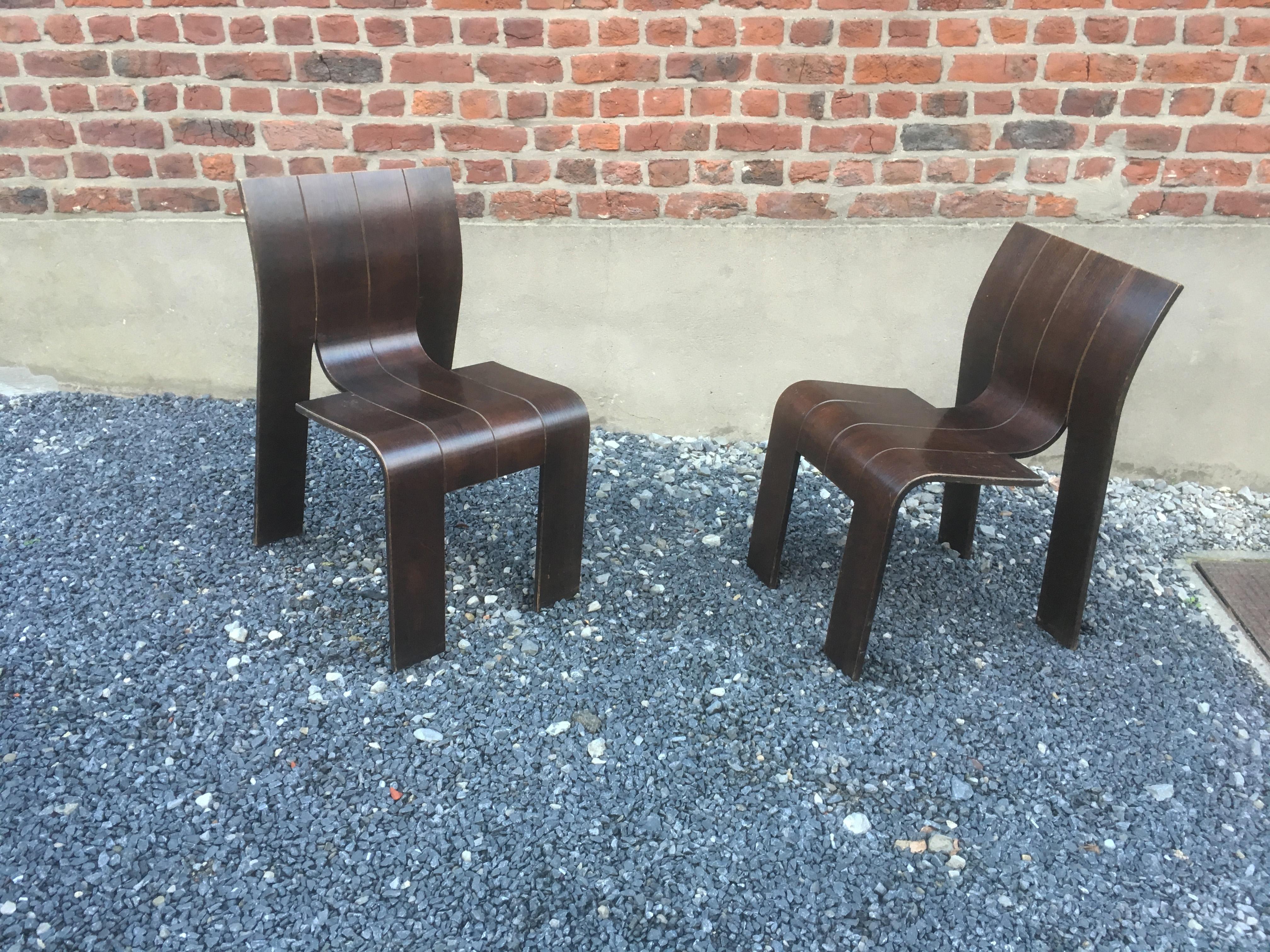 1974, Gijs Bakker, Castelijn, four stackable bended wood strip chair.
