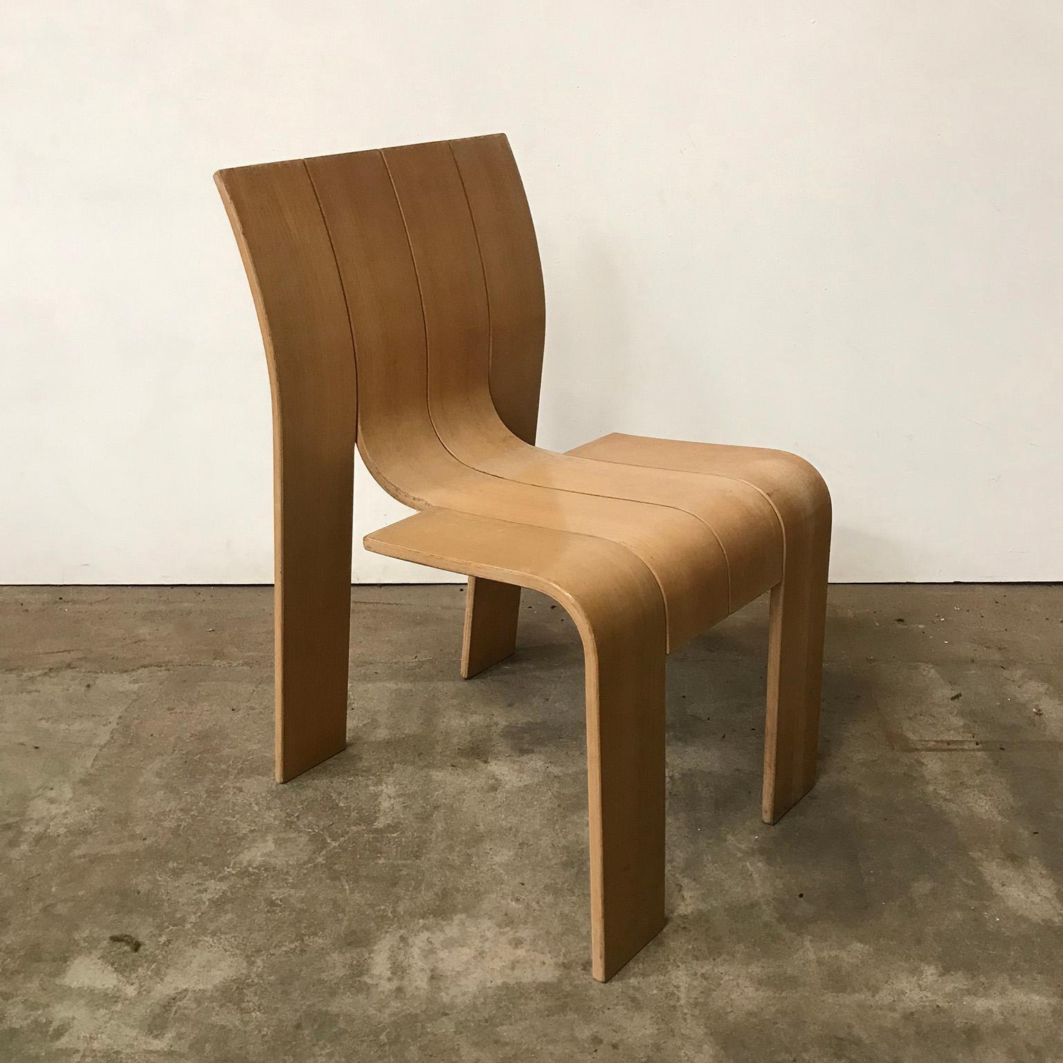 Dutch designed, chair of bended wood. The chair has no frame. The chairs have a 