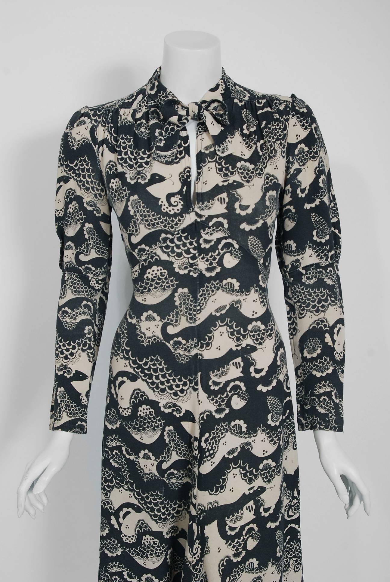 Extremely rare Ossie Clark for Radley sea serpent/snake print moss crepe dress dating back to 1974. English fashion designer, Raymond Ossie Clark, was a leading light in the London swinging sixties fashion era and is now renowned for his romantic