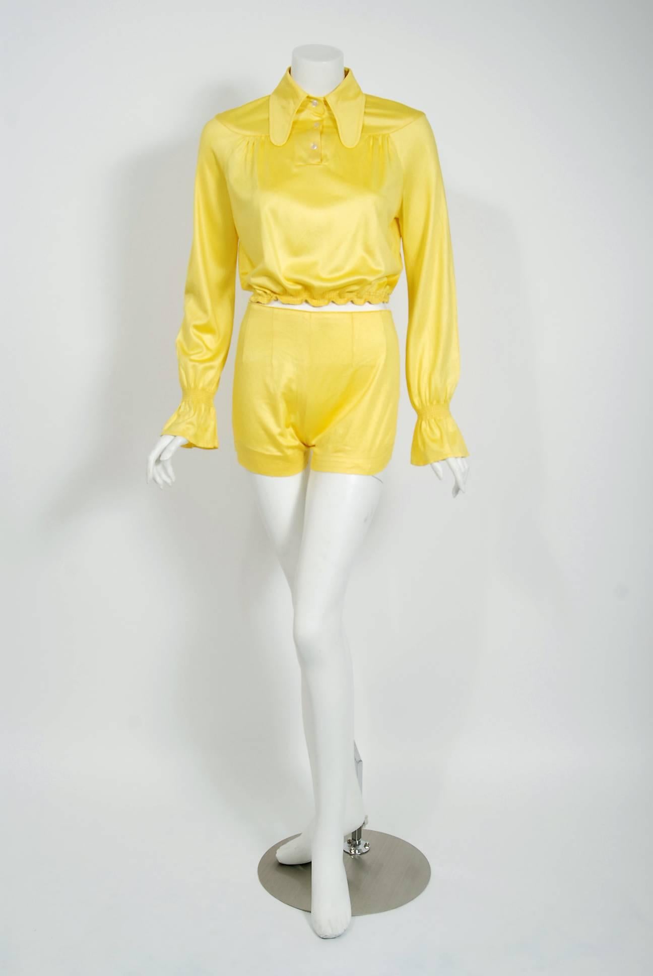 A captivating buttercup yellow Ossie Clark for Radley ensemble dating back to the mid 1970's. This rare set is fashioned from tricel jersey which has a lovely shine when worn. I also adore the dramatic three-button beagle collar cropped blouse with