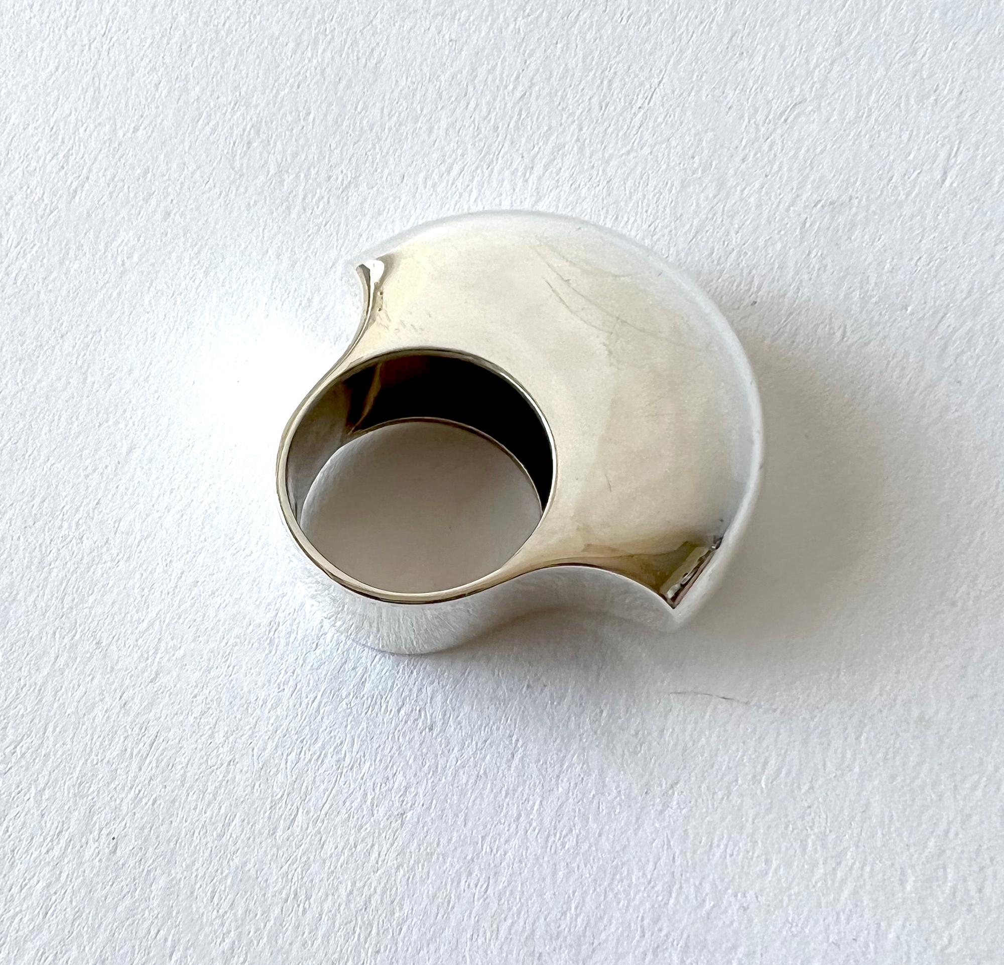 Sterling silver Finnish modern dome ring created by Pekka Piekainen, for Auran Kultaseppa Oy, circa 1975.  Ring is a finger size 6 and is signed with Auran Kultaseppa Oy hallmark, 925, X7 (1975), PP, Finland.  In very good vintage 1970s condition.  
