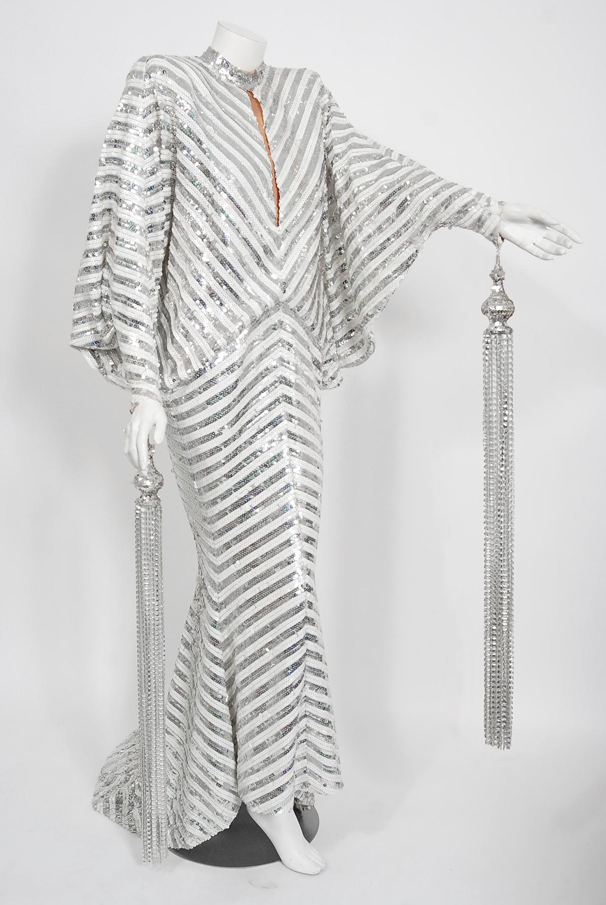 A breathtaking, museum quality Ret Turner couture gown custom made for the famous American icon, Diana Ross. Not only does this one-of-a-kind treasure come with official certificate of authenticity, we even found the design sketch for Diana Ross!