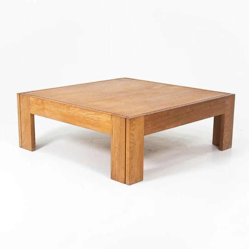This is a low square coffee table, executed in chunky quarter sawn white oak. It was designed by Tage Poulsen in 1975 for CI Designs, the licensed manufacturer of his designs at the time. While seemingly simple in form, the components for this piece