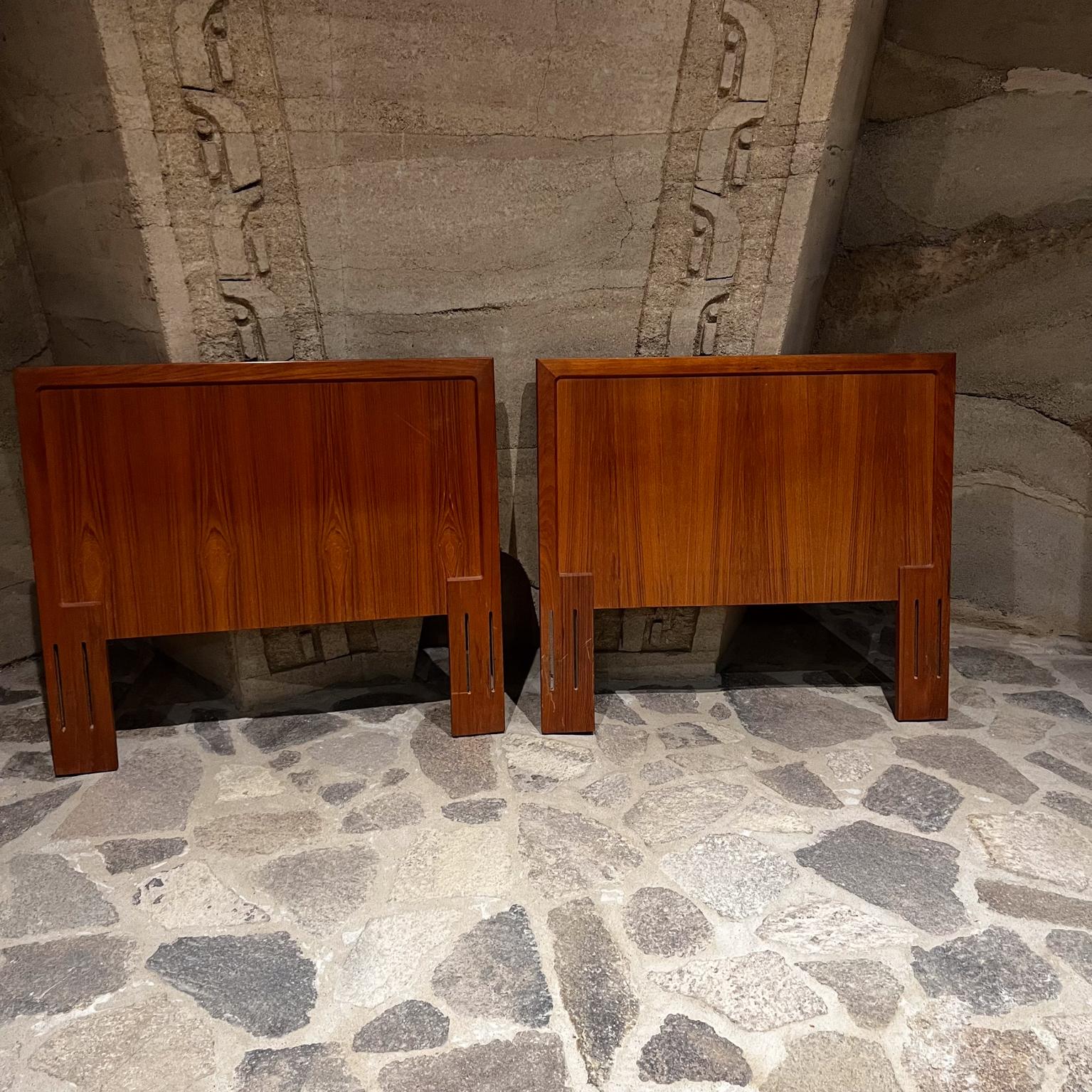Twin Teak Headboards by Vinde Mobelfabrik. 
(can double up to configure as a king headboard)
Maker stamped. Denmark 75.
after Moreddi.
One headboard has minor scuffs upper right corner.
Original preowned vintage unrestored condition.
Refer to images
