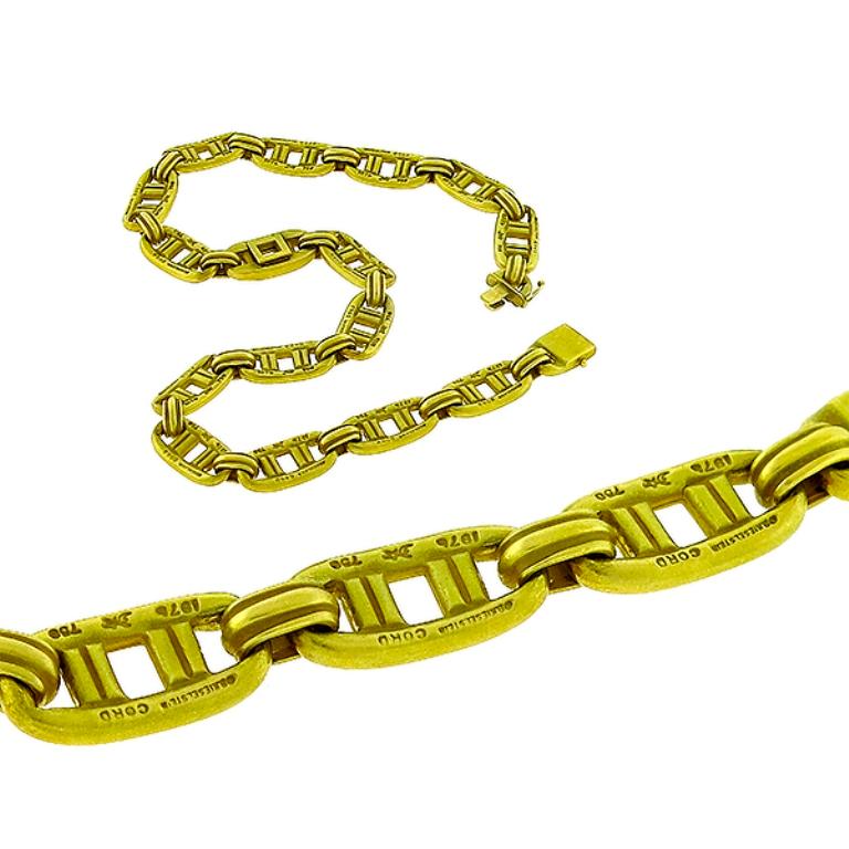 This is a signed designer Barry Kieselstein-Cord 18k green gold necklace. It measures 15 1/2 inches in length, 10.5mm in width, and 117.1 grams in weight.
Each of the chain links are signed.

Inventory #59640NBSS