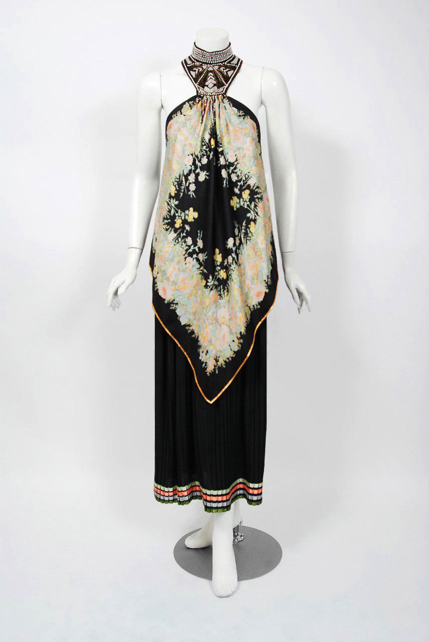 Breathtaking Bill Gibb documented designer gown from his 1976 collection. His pieces are very collectible and found in museum's around the globe. The mixture of textiles on this dress is genius; floral print handkerchief pointed silk with black