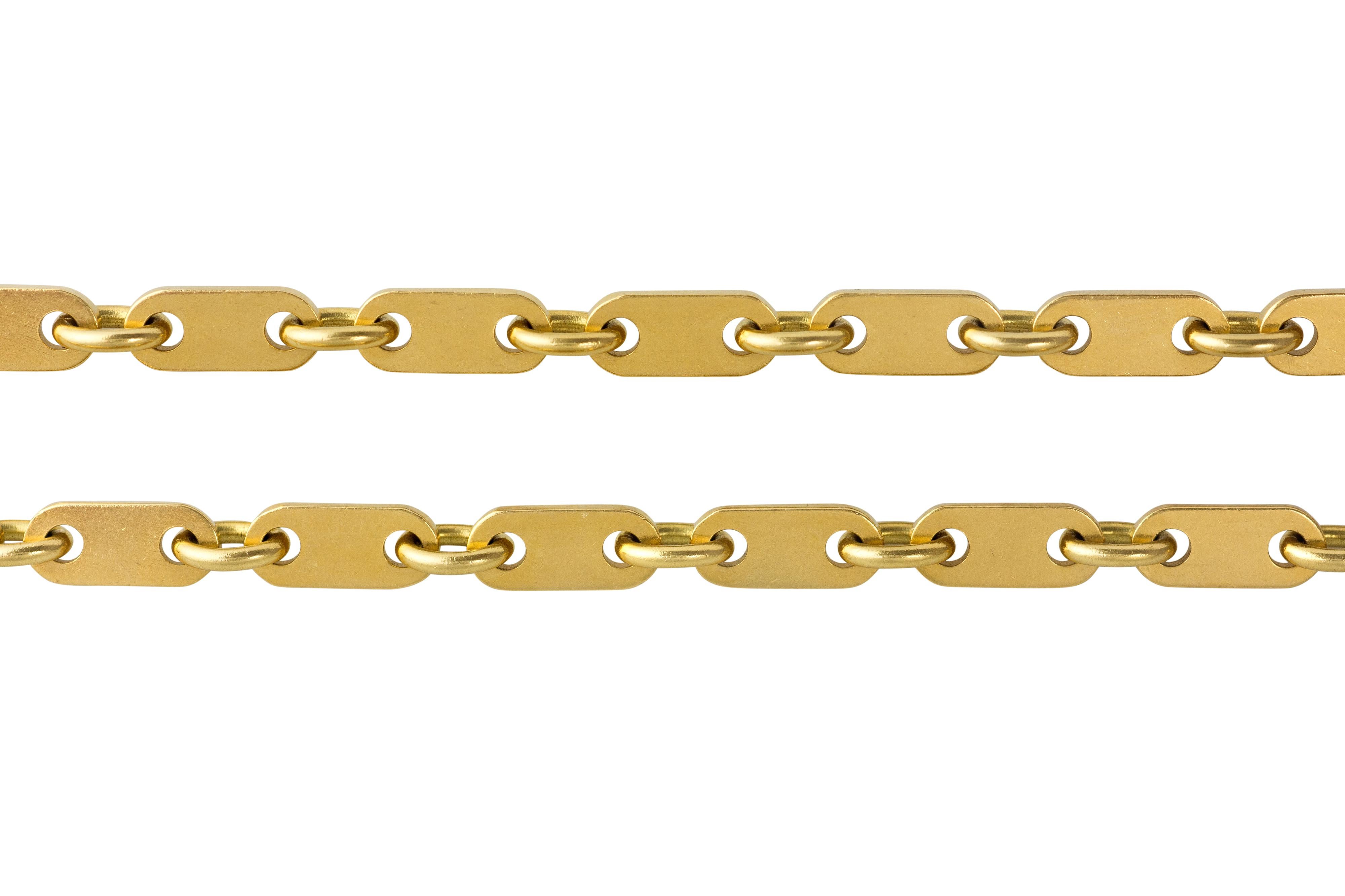 An 18 karat gold rectangular link chain, by Cartier London, 1976.

Chain measures 31.5