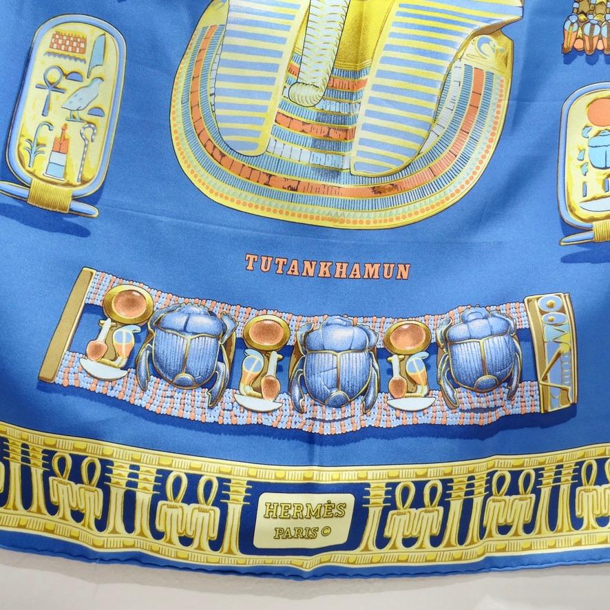 Hermes pays homage to ancient Egypt with this gorgeous Tutankhamun silk scarf designed by Vladimir Rybaltchenko in 1976! The most gorgeous and detailed graphic of ancient Egyptian figures and symbolism complimented by a gold border. A gorgeous