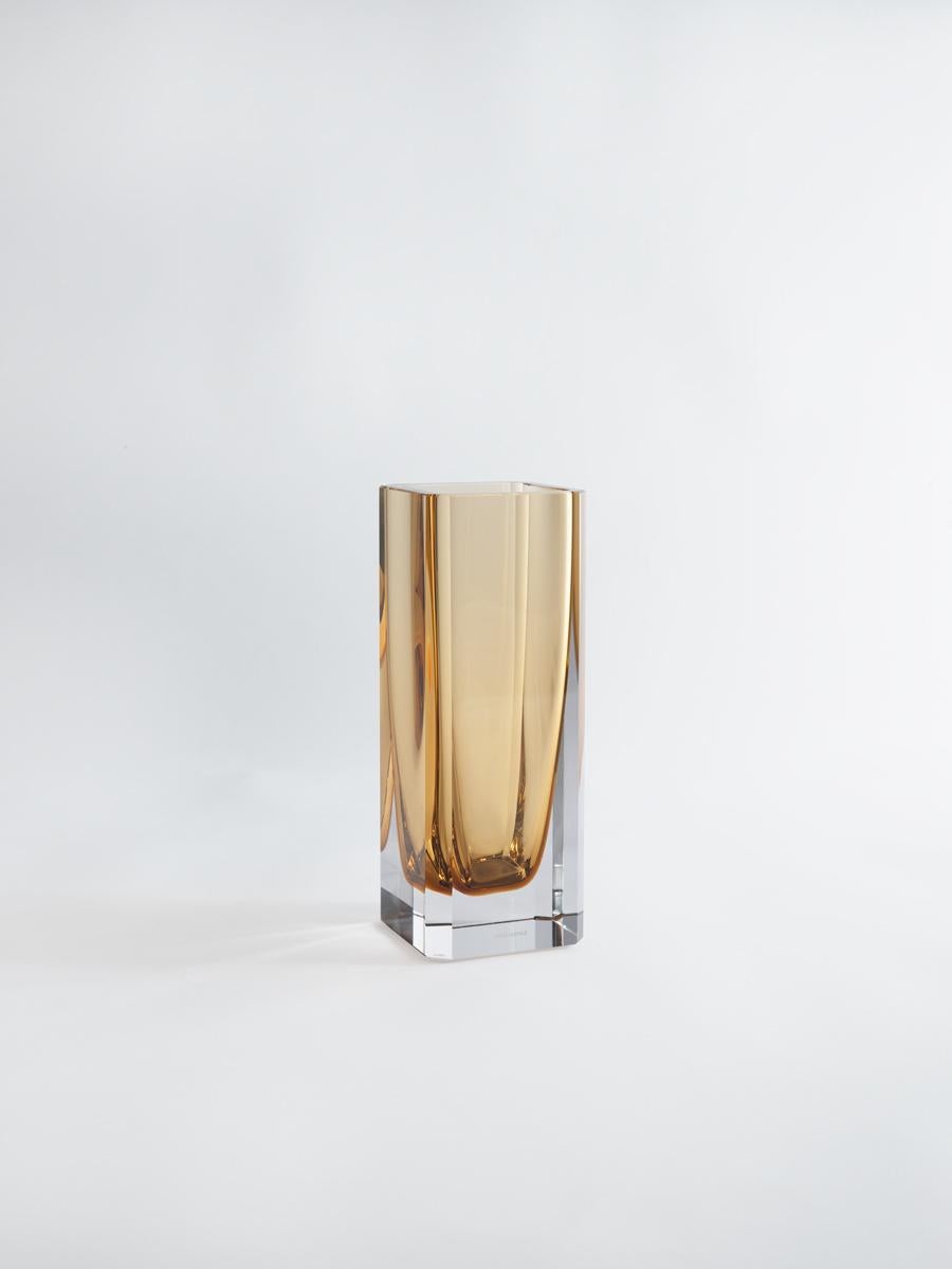 With their clean, minimalist lines, faceted corner detail and sultry colours, 

Greg Natale’s new 1977 vases will make a sophisticated addition to any room.
The vases are part of the Greg Natale Nightlife collection and their name is layered with