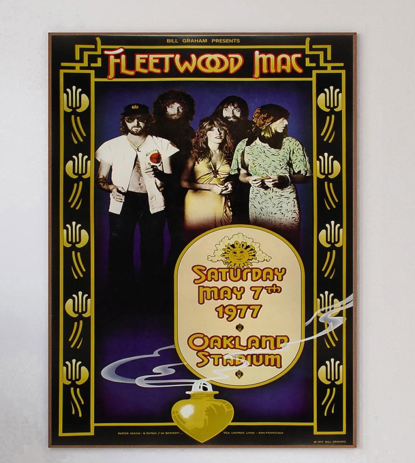 Designed by concert poster artist Randy Tuten and William Bodstedt, this beautiful poster was created in 1977 to promote a live concert of Fleetwood Mac at the world famous Oakland Coliseum in California. Bill Graham events such as this were well