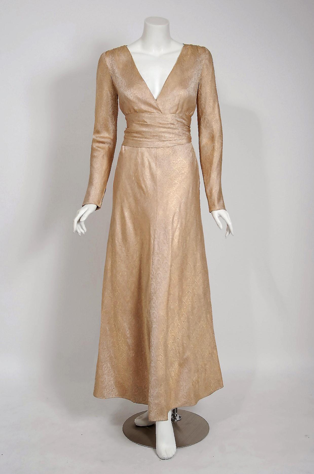 Givenchy, the name itself evokes glamour, refined elegance, simplicity and style. Givenchy's trademark of sculpted lines and luxurious fabrics make his work easily recognizable. This gorgeous gold gown, dating back to his 1977 haute couture