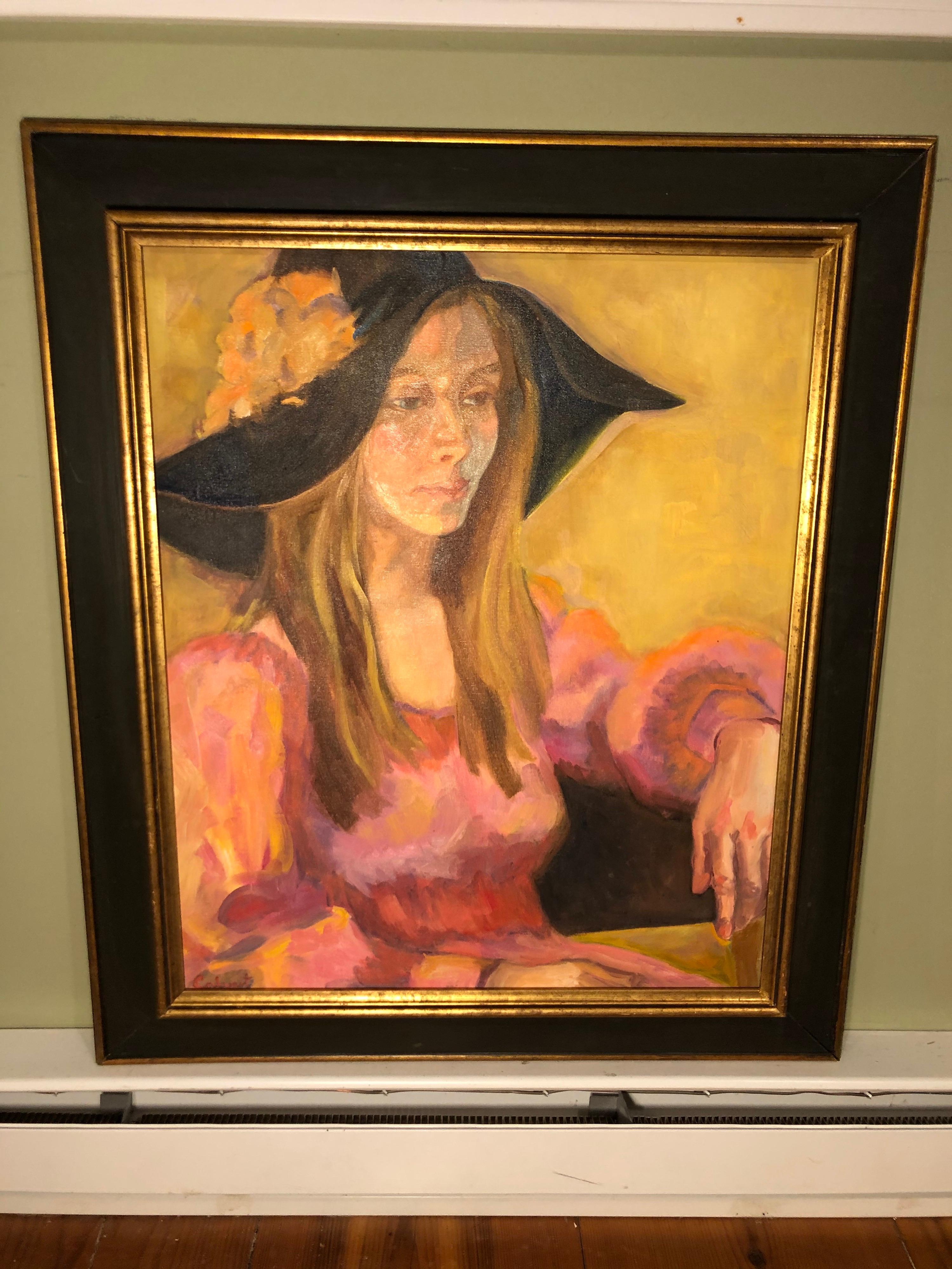 1977 Joni Mitchell Style Portrait Signiert Peggy Calvart. Öl auf Leinwand. Die Künstlerin sieht der Folksängerin Joni Mitchell sehr ähnlich.
Stil der 1970er Jahre mit Hut und Kleidung. Untergebracht in einem dramatischen schwarz-goldenen Rahmen.