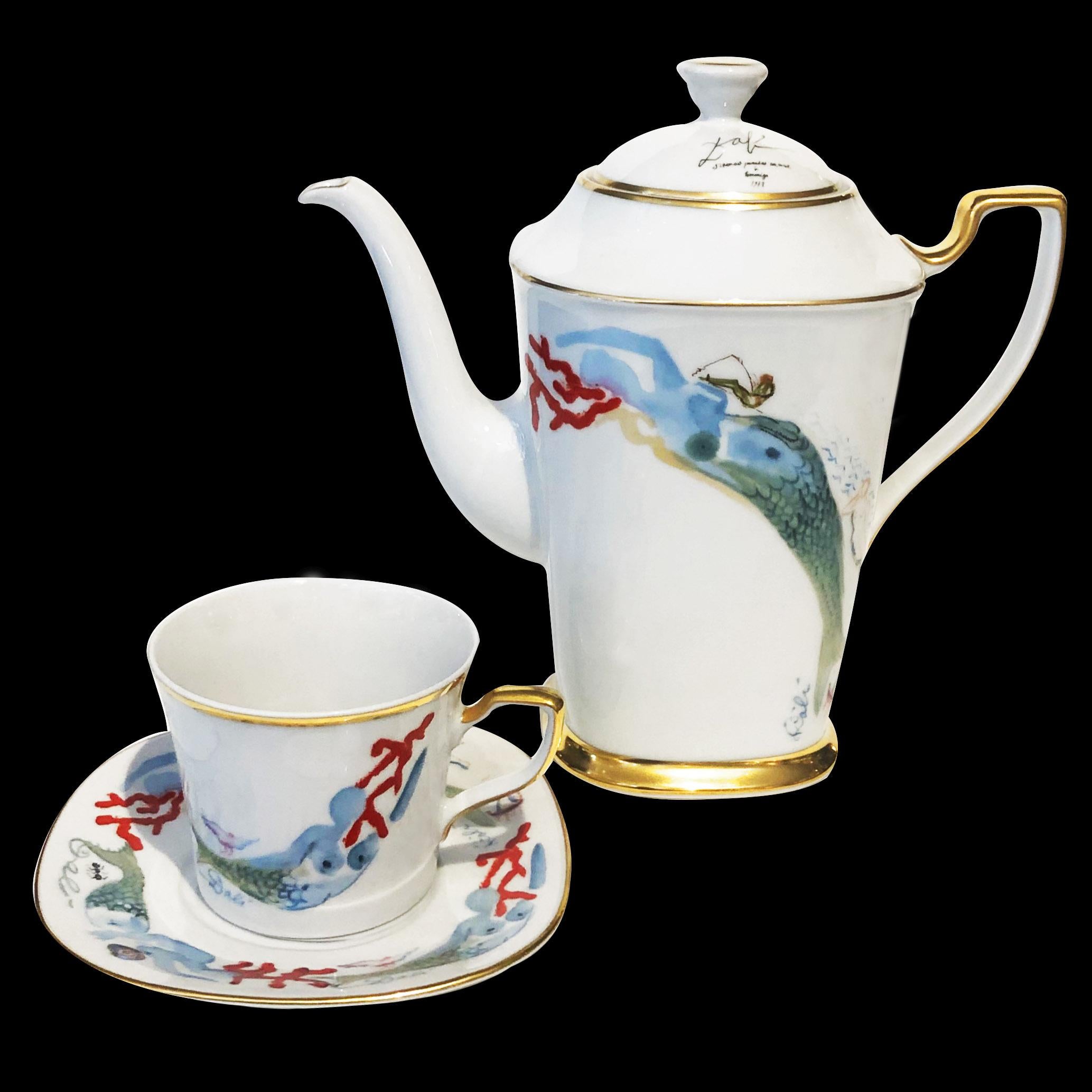Salvador Dalí (1904-1989) world-famous Spanish painter, graphic artist, and sculptor of surrealism, designed this porcelain limited edition painted 19 pieces of coffee service porcelain with 24-karat gold trim in 1977.
Plate signed; on front and