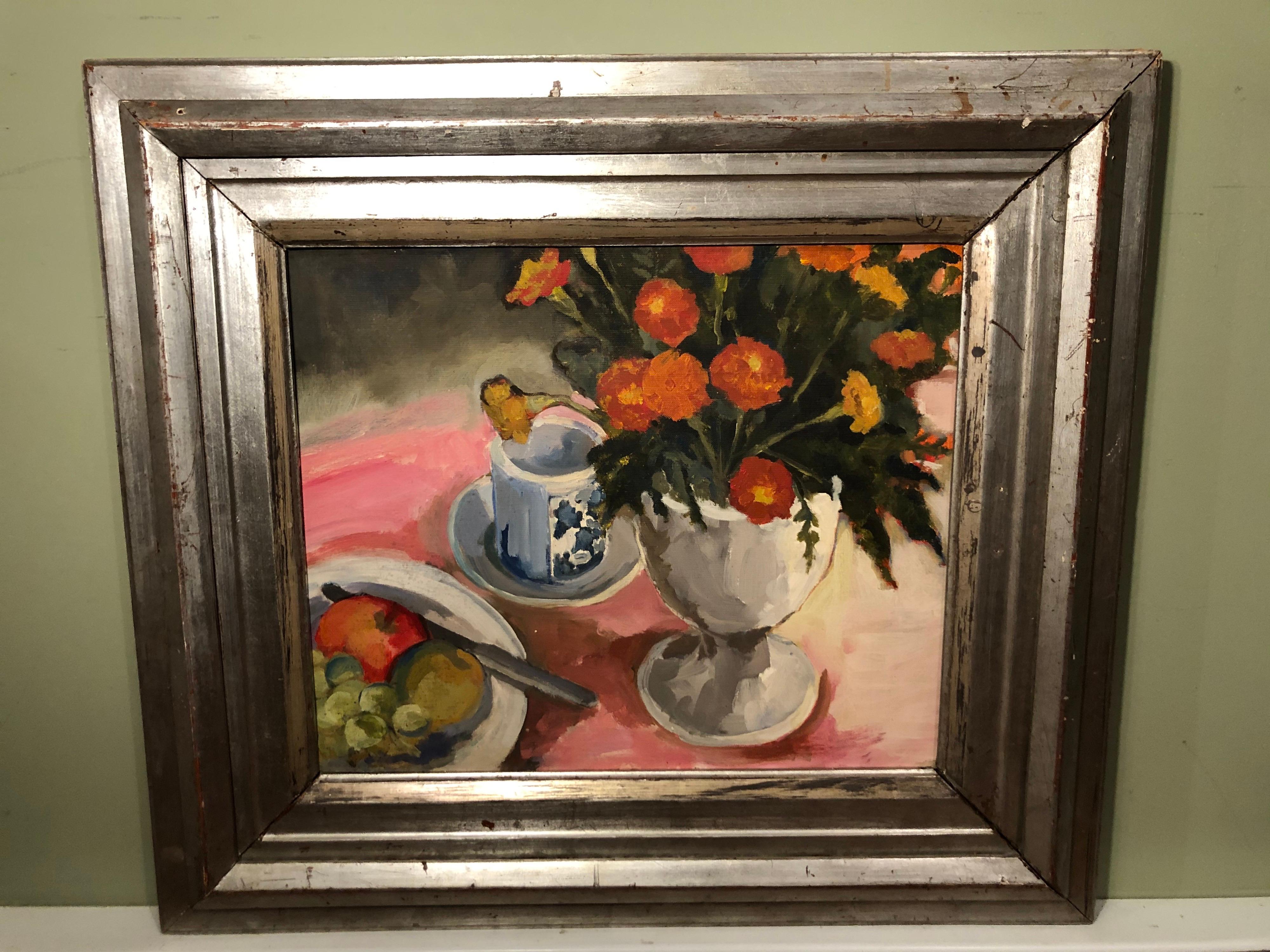 1977 still life of Marigolds by Arlene Skutch. Large composition by native Westport CT artist. Nice largecompostion on canvas of a floral still life . Housed in a thick solid wooden silver gilt frame.
Prior to Arlene Skutchs career as a visual