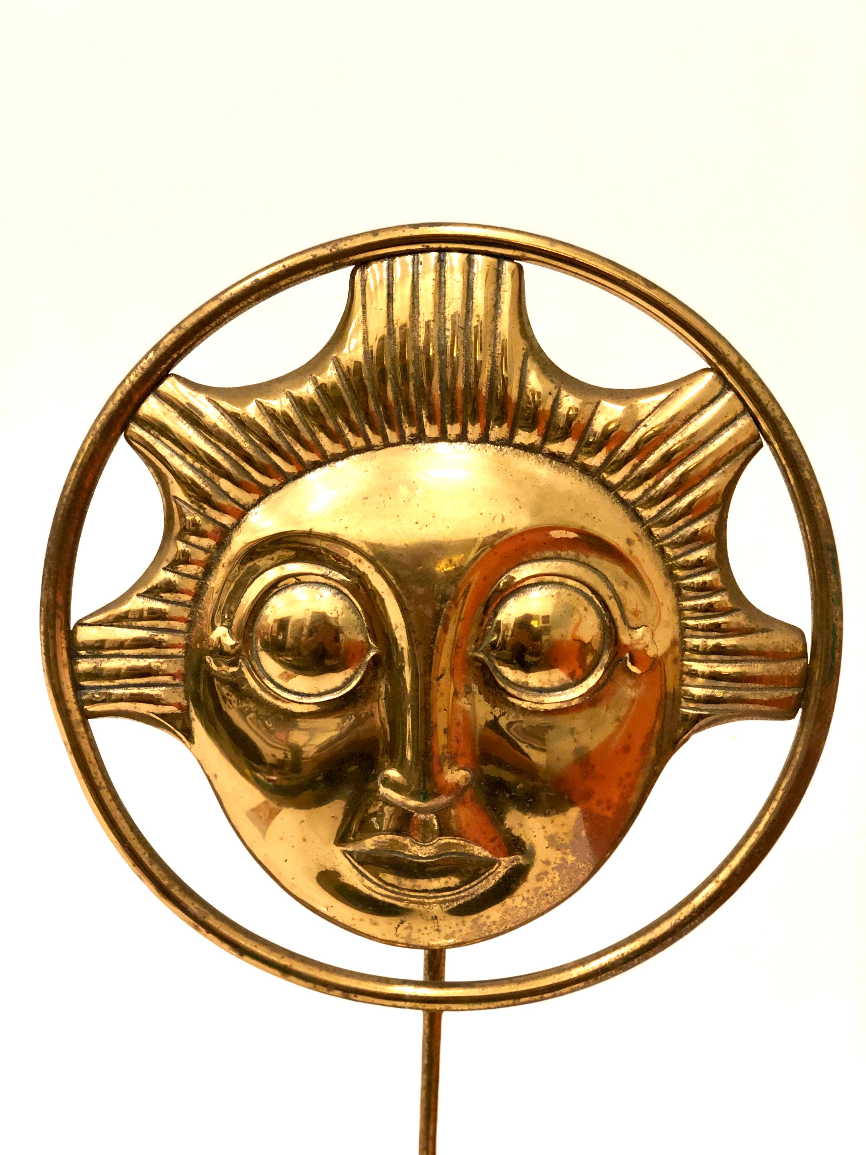 Rare solid brass sun sculpture, circa 1977 stamped at the bottom, nice polished finish with some patina natural to age.