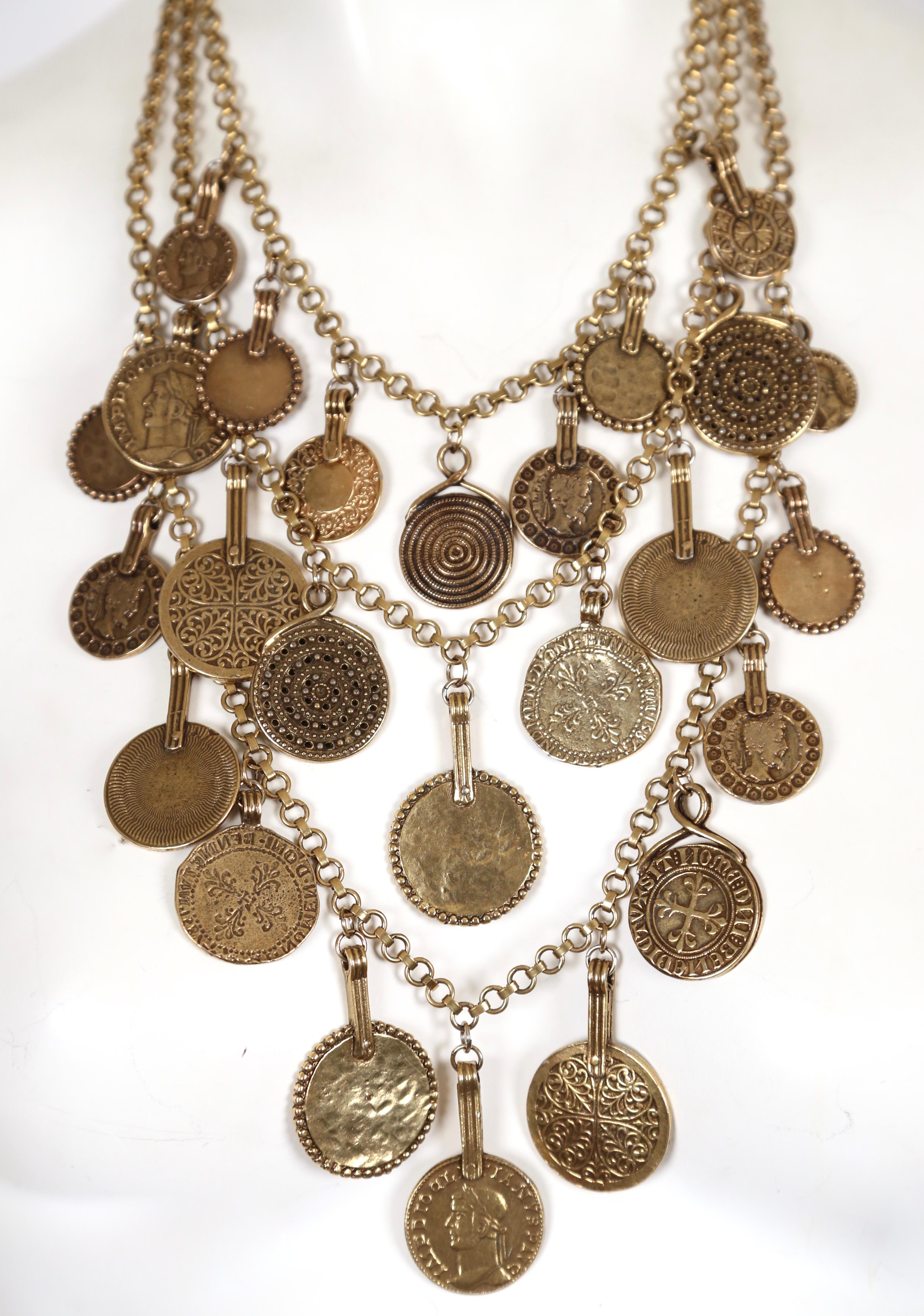 Very rare, triple layered ancient Byzantine style coin necklace from Yves Saint Laurent dating to spring of 1977 as seen on the runway and documented in several magazine editorials. Approximate measurements of inner strand is 18